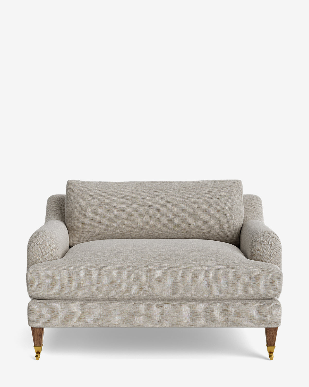 The Lucille English Roll Arm Chair and a Half, shown from the front against a white background, features light beige upholstery, classic English roll arms, a down-wrapped cushion, wooden legs, and brass caster wheels on the front legs, by McGee & Co.