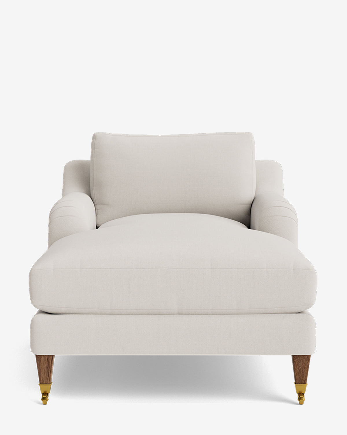 The Lucille English Roll Arm Chaise Lounge features a plush, light beige upholstered seat, classic rolled arms, a down-wrapped cushioned back, and wooden legs with brass casters for timeless elegance, by McGee & Co.