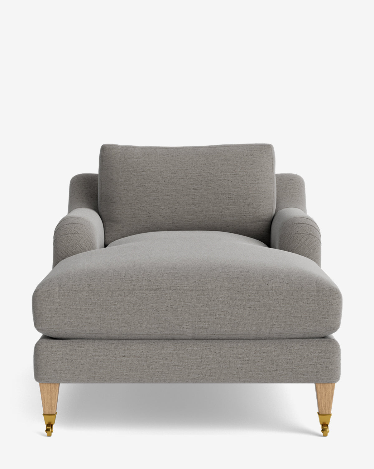 A front view of the Lucille English Roll Arm Lounge Chair, a modern, wide, light gray upholstered chaise with wooden legs, two brass casters on the front legs, and a down-wrapped cushion for comfort, set against a white background by McGee & Co.