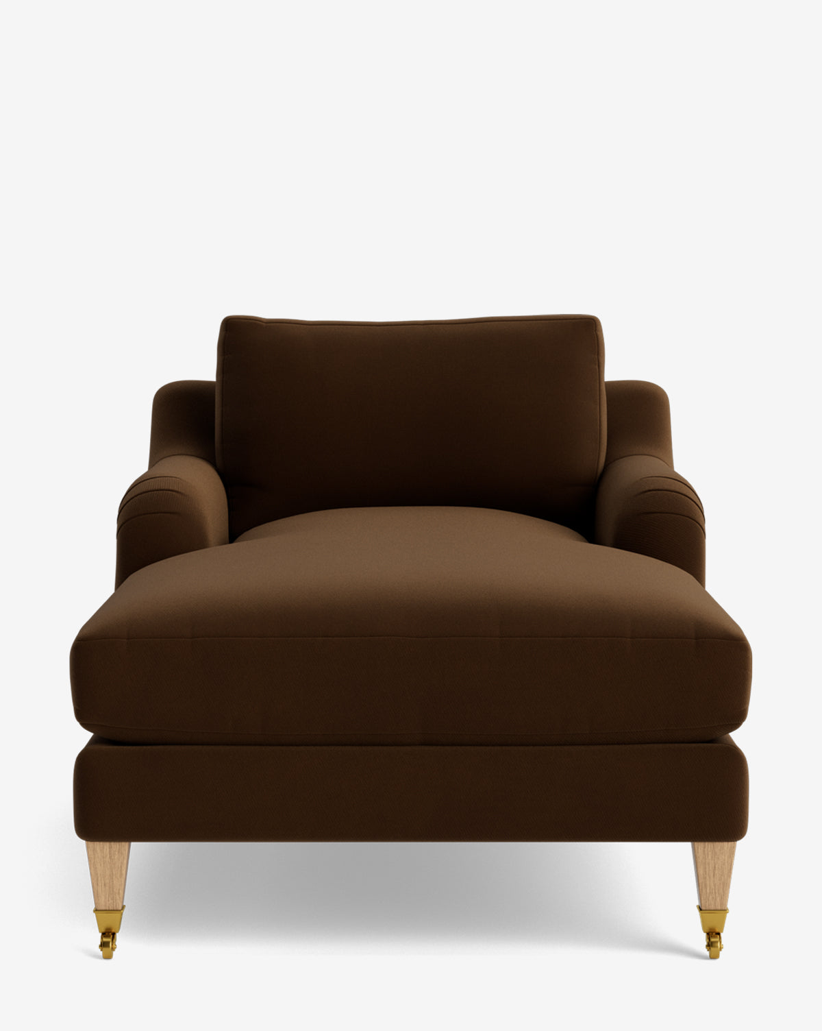 The Lucille English Roll Arm Lounge Chair is shown front-facing with brown upholstery, a cushioned backrest, down-wrapped seat, curved armrests, and light wooden legs—two with small brass casters, by McGee & Co.
