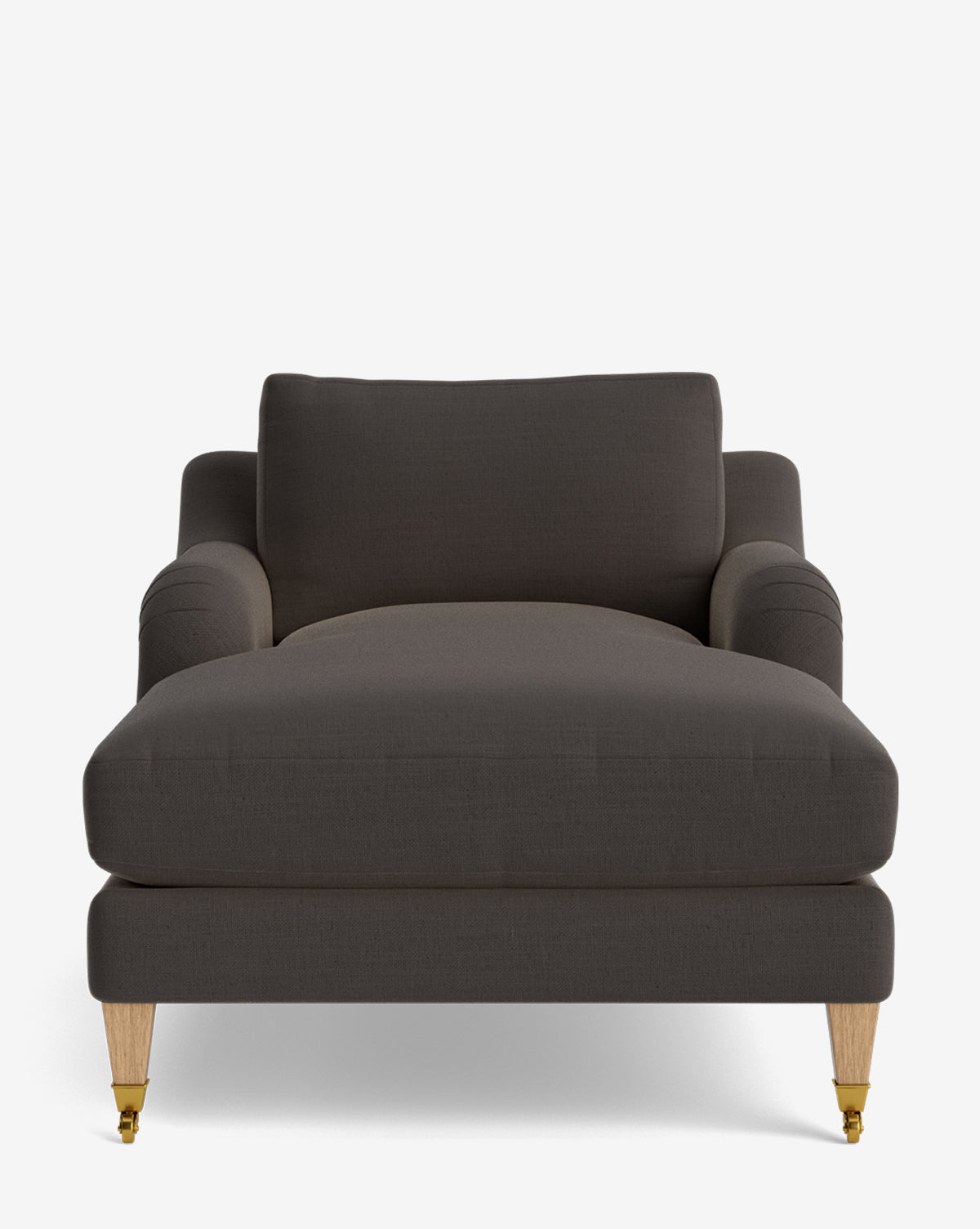 Front view of the Lucille English Roll Arm Lounge Chair with dark gray upholstery, low English roll arms, wooden legs with brass front casters, and a plush down-wrapped cushion, set against a plain white background by McGee & Co.