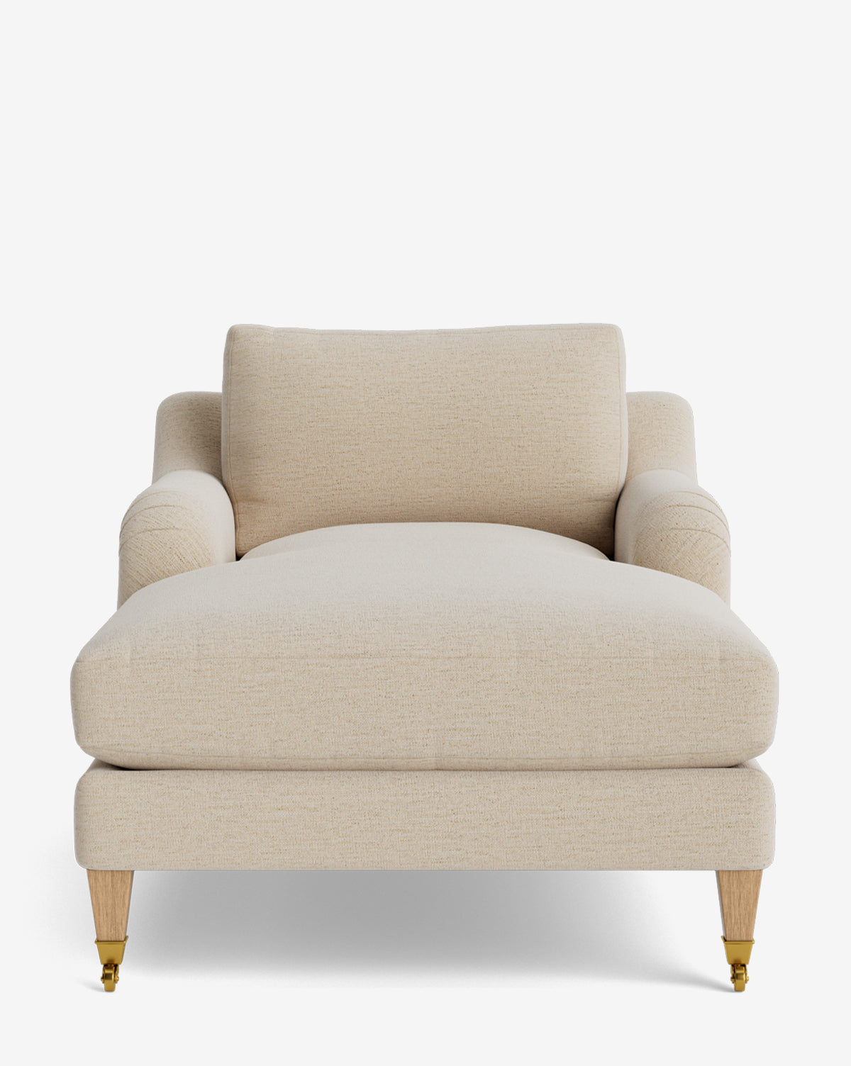 The Lucille English Roll Arm Lounge Chair features a wide, cream-colored upholstered design with plush backrest, rolled arms, wooden legs with brass casters, and a luxurious down-wrapped cushion, by McGee & Co. Shown against a plain white background.