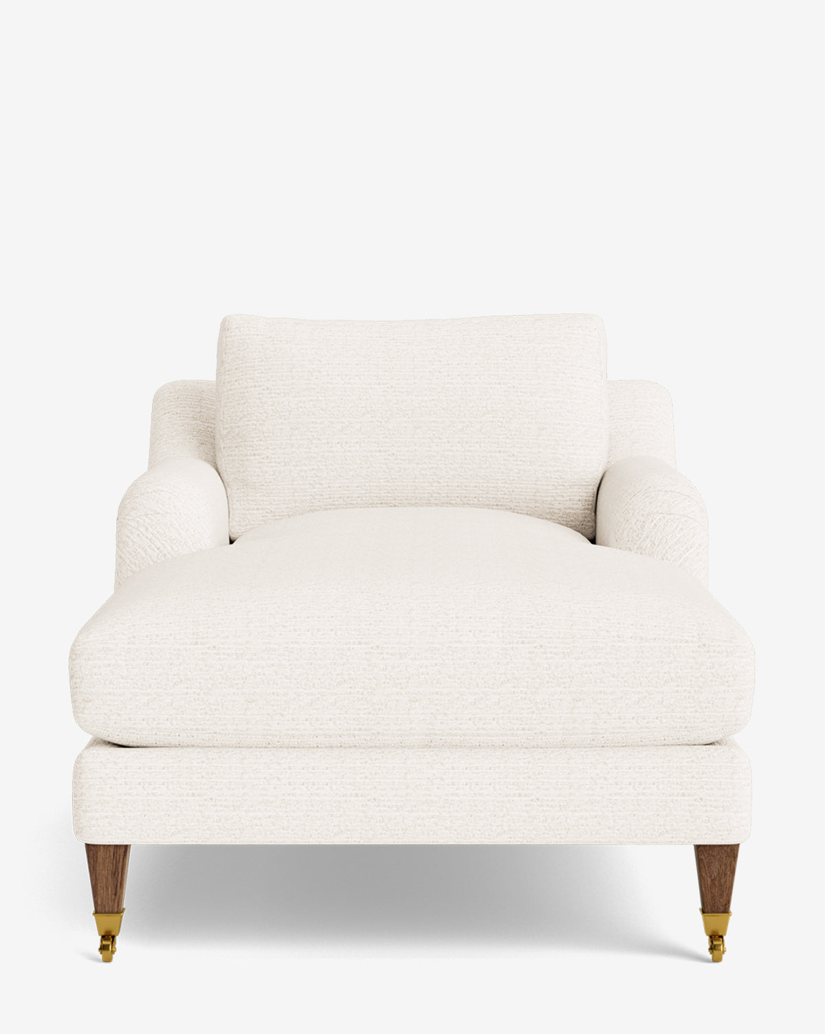 The Lucille English Roll Arm Chaise Lounge features a plush, cream-colored design with a wide seat, down-wrapped cushion, low arms, and wooden legs with brass casters, shown against a plain white background by McGee & Co.