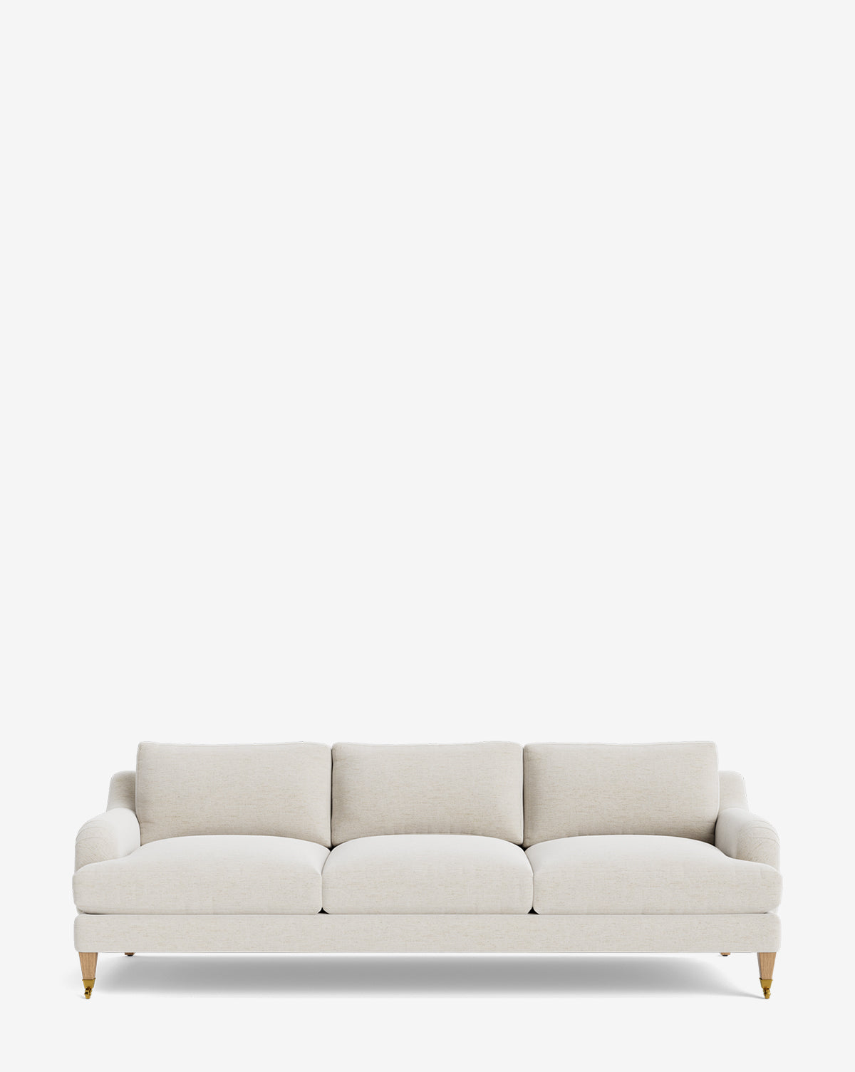 The Lucille English Roll Arm Sofa 90.5 features light beige upholstery, plush down-wrapped cushions, and slim wooden legs with brass caps, presented against a plain white background by McGee & Co.