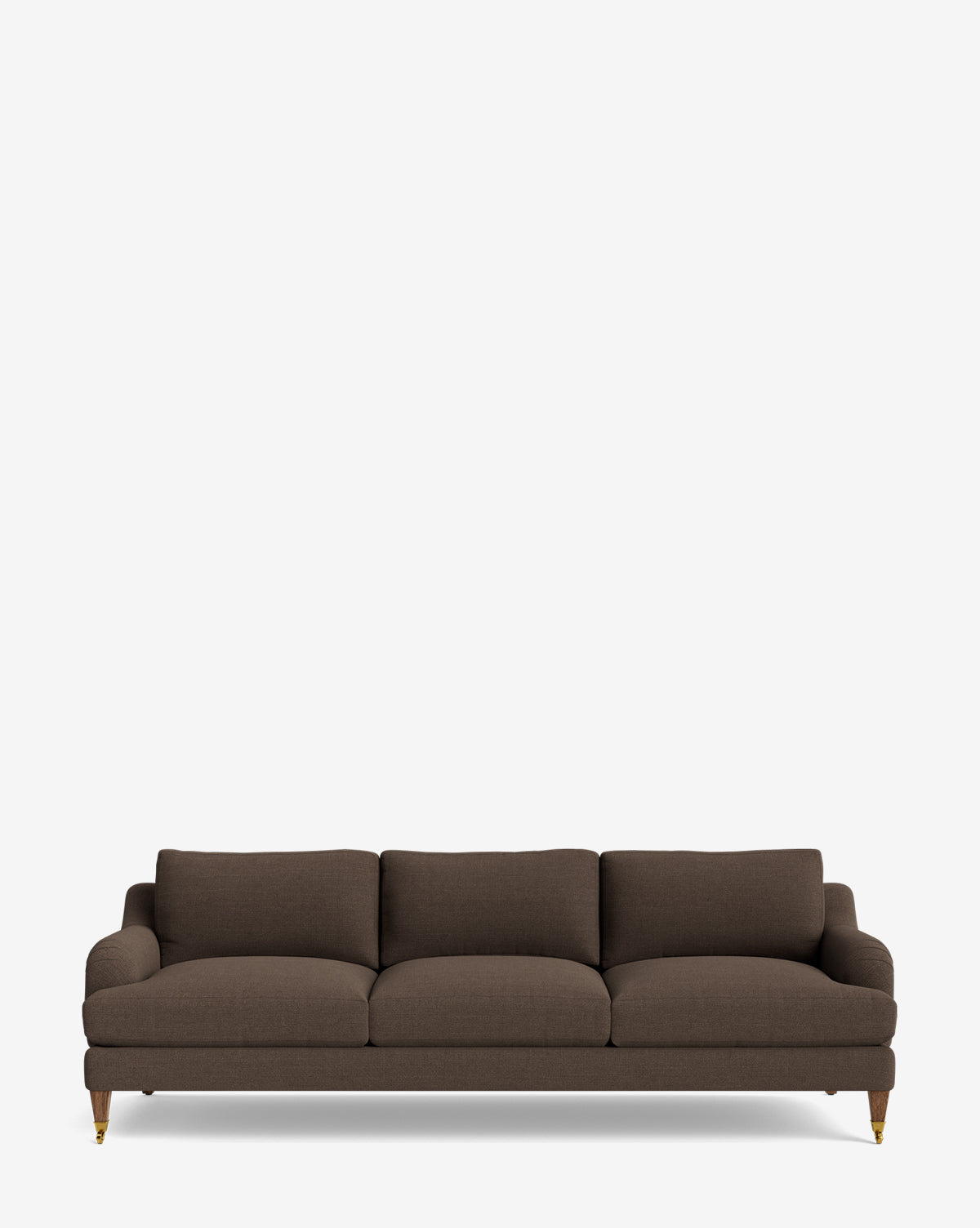 The Lucille English Roll Arm Sofa 90.5 in dark brown features three down-wrapped seat and back cushions, low arms, and wooden legs with brass castors, set against a white background—a customizable piece for any living space by McGee & Co.
