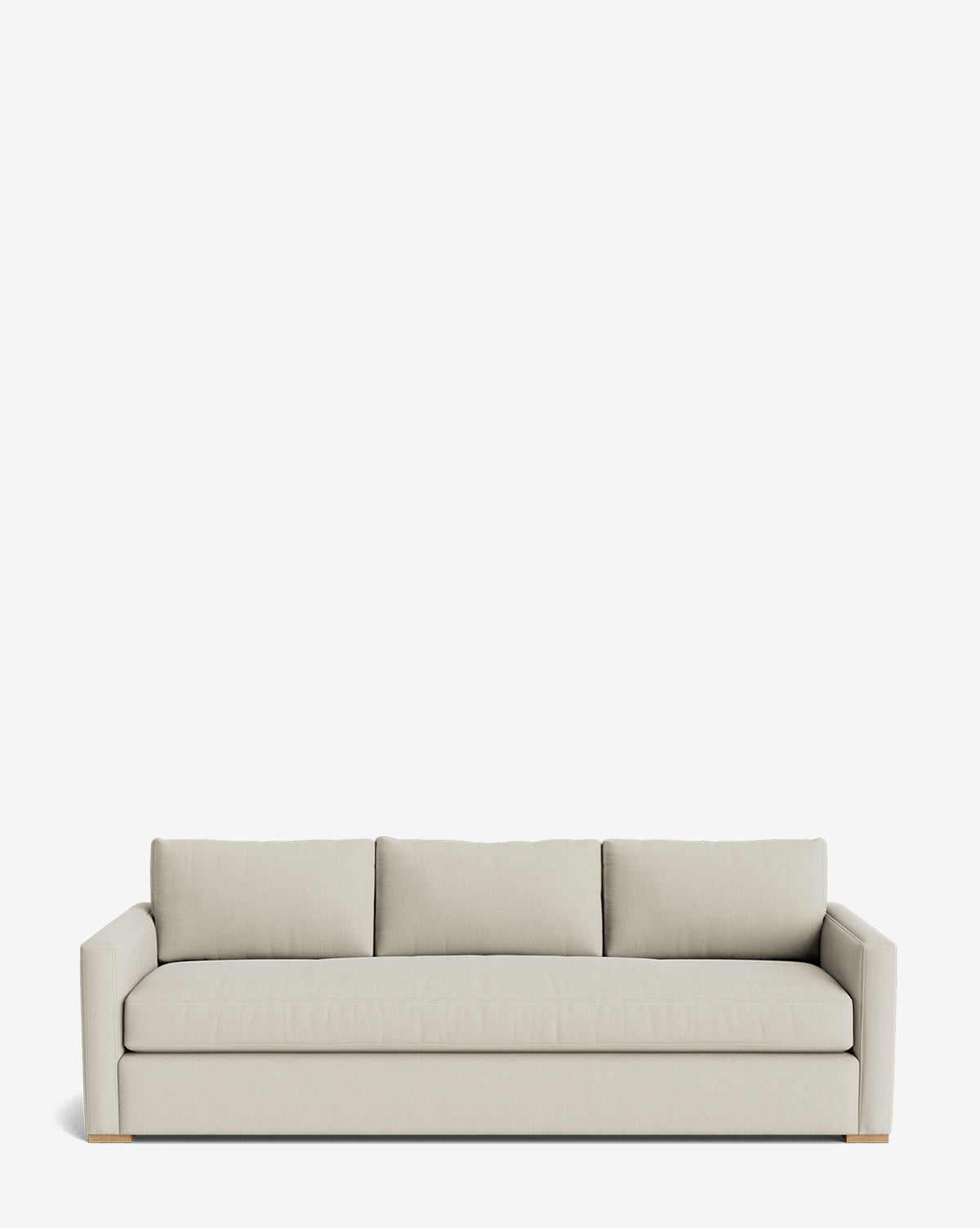 The Macy Upholstered Sofa (84-96) is a modern, light beige sofa with three seat and back cushions, straight armrests, and a minimalist design—perfect for contemporary living rooms, shown against a plain white background by McGee & Co.