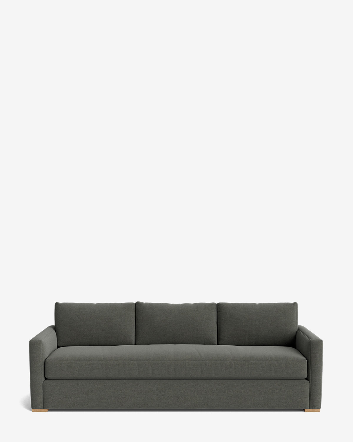 The Macy Upholstered Sofa (84-96) features a modern dark gray design with square arms, three back cushions, and wooden block feet, adding sleek style to your living room against a plain white background by McGee & Co.