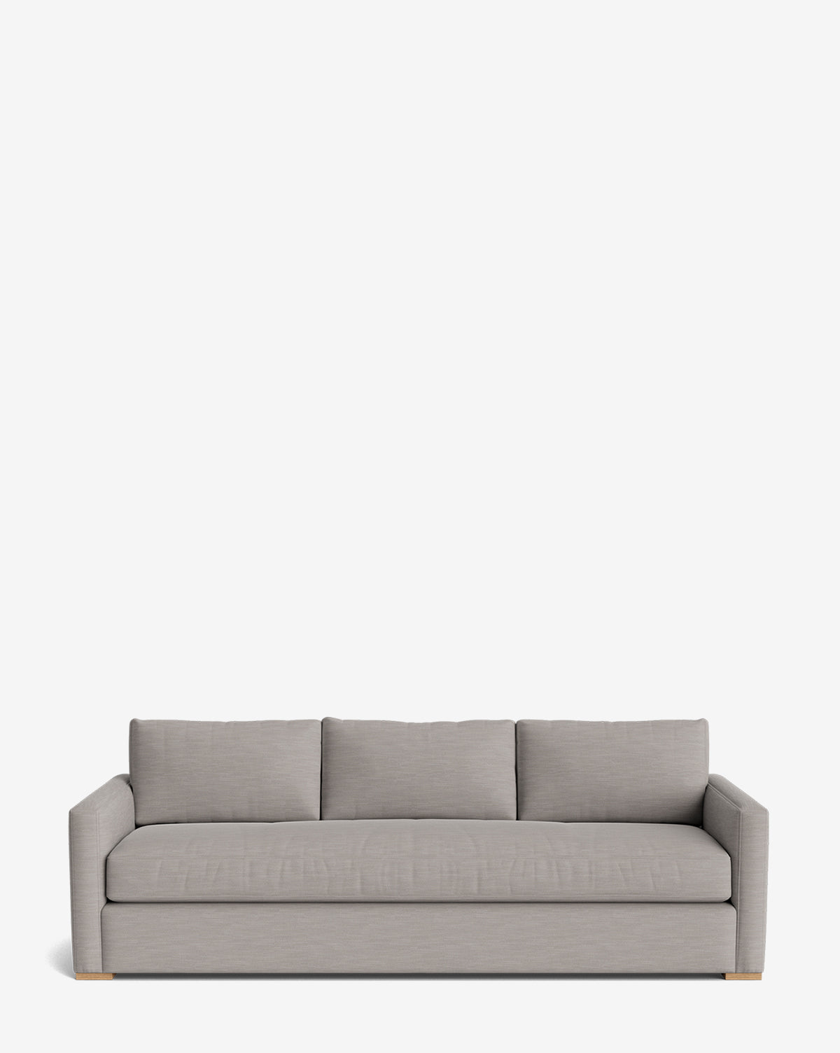 The Macy Upholstered Sofa (84-96) features a modern, light gray design with clean lines, square arms, and three back cushions—an ideal addition to your living room, by McGee & Co.