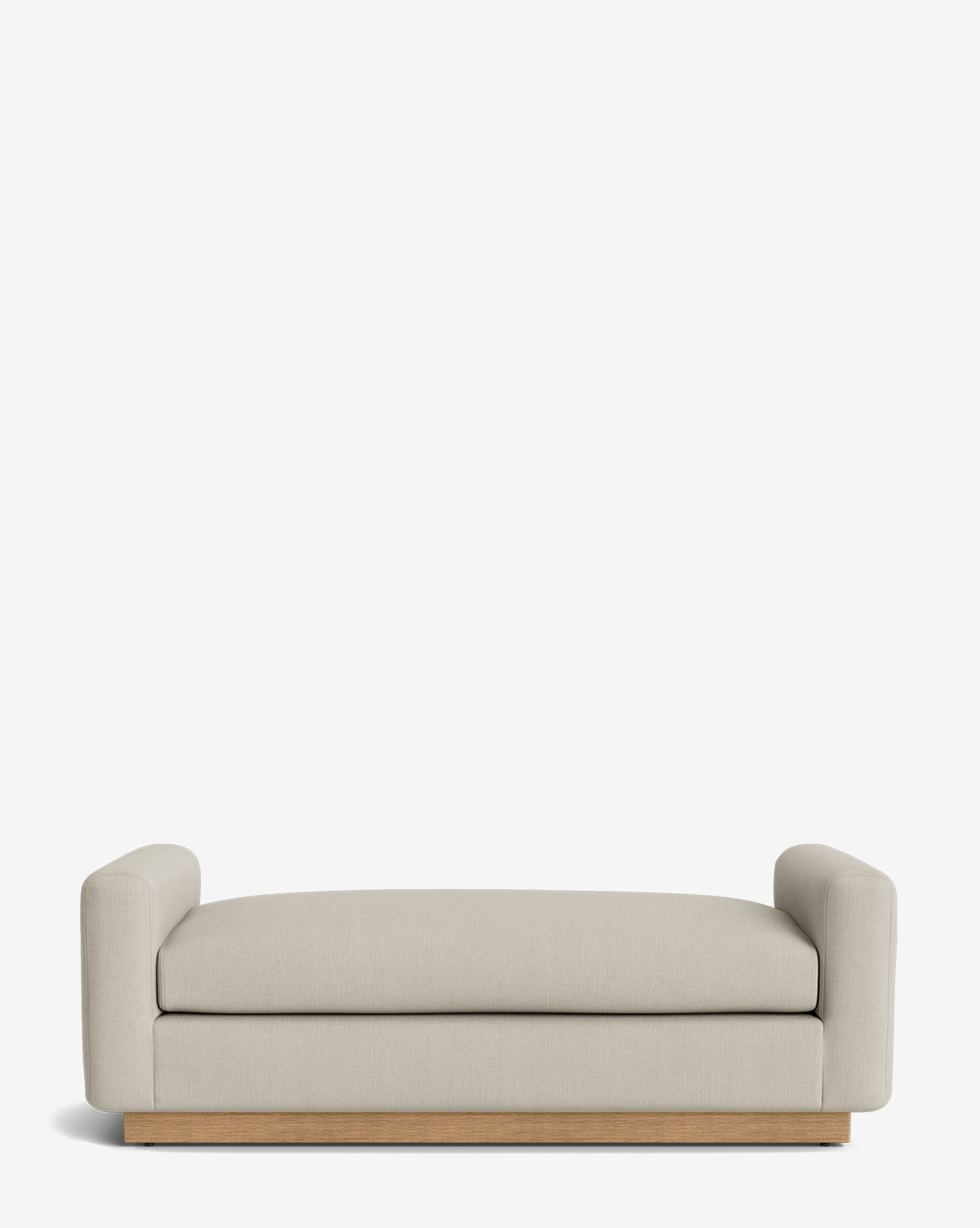 The Mansfield Bench features light beige upholstery, cylindrical armrests on both sides, and a wooden base, displayed against a plain white background by McGee & Co.