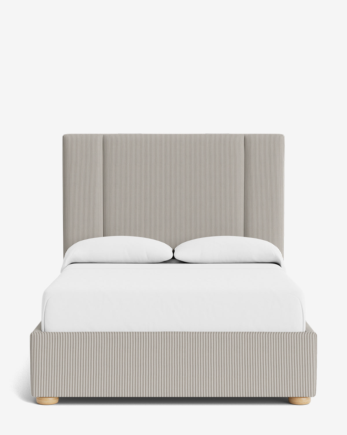 The Mina Bed is a modern light gray upholstered bed with tall vertical panels and matching base. It includes two white pillows and a white sheet, shown from the front against a white background, by McGee & Co.