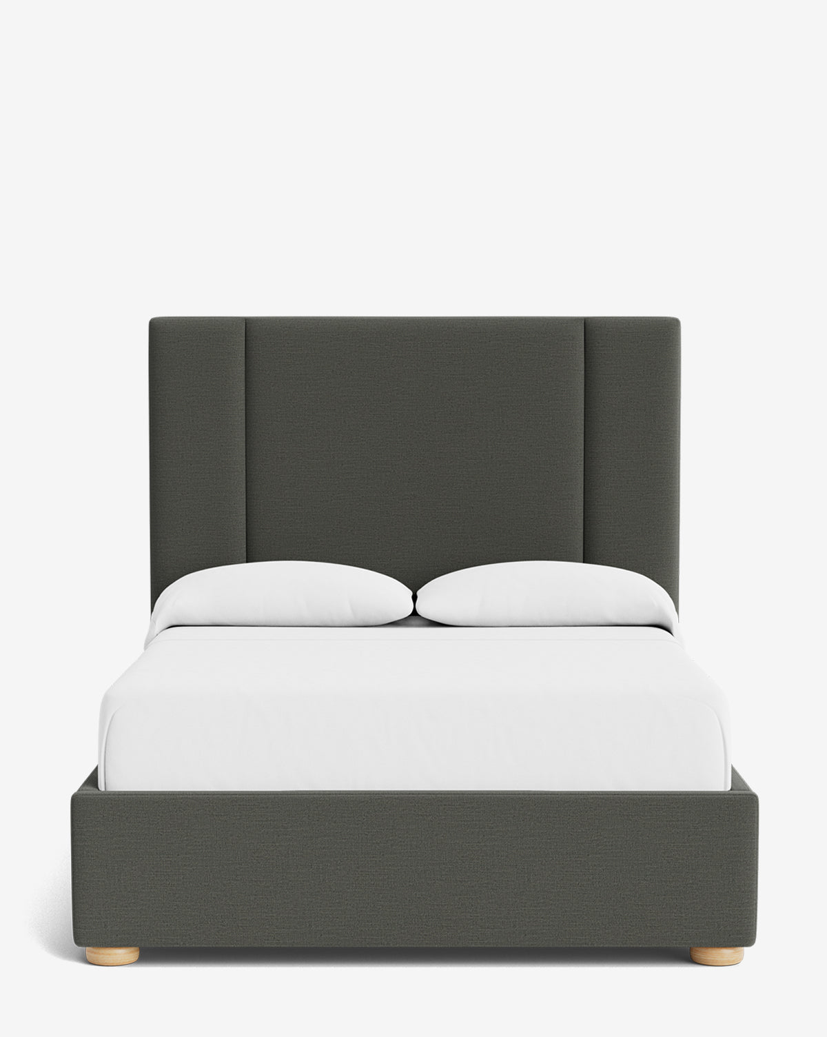 The Mina Bed is a modern bed frame in dark gray upholstery with a tall headboard, made from premium fabric. Styled with white bedding and two pillows, it’s shown against a plain white background by McGee & Co.