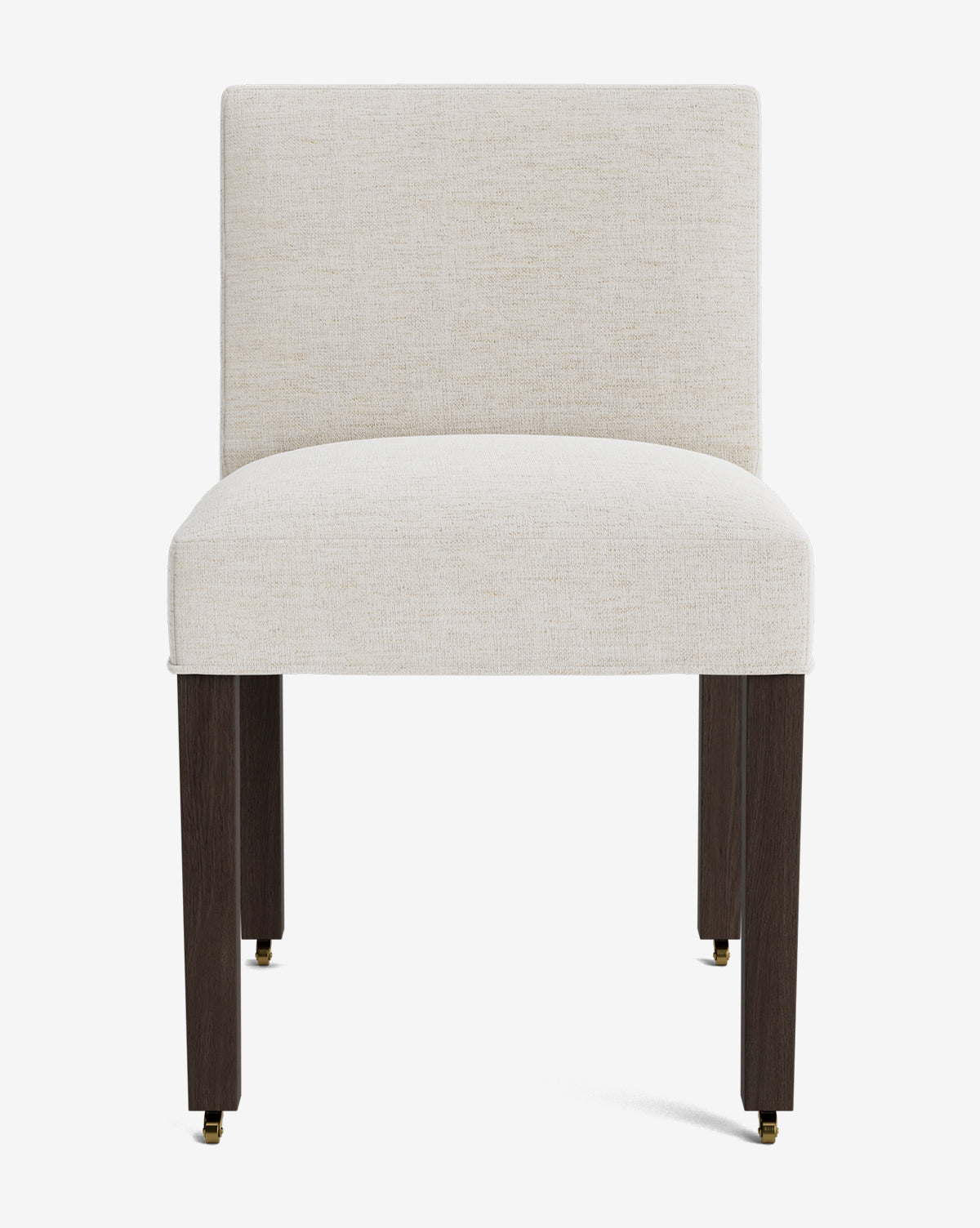 The Olivier Upholstered Dining Chair features a cream fabric seat and backrest, supported by four dark wooden legs with brass casters. Its simple, contemporary design brings a modern touch to any dining space by McGee & Co.