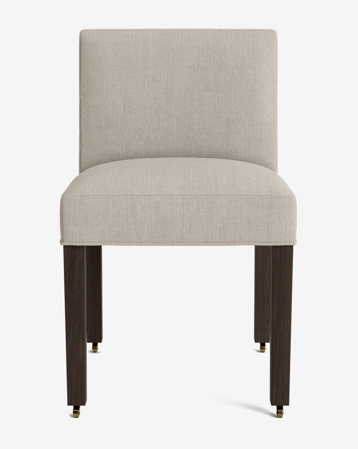 Front view of the Olivier Upholstered Dining Chair featuring a beige high-quality fabric seat and backrest, supported by four dark wooden legs with small brass casters at the bottom, by McGee & Co.