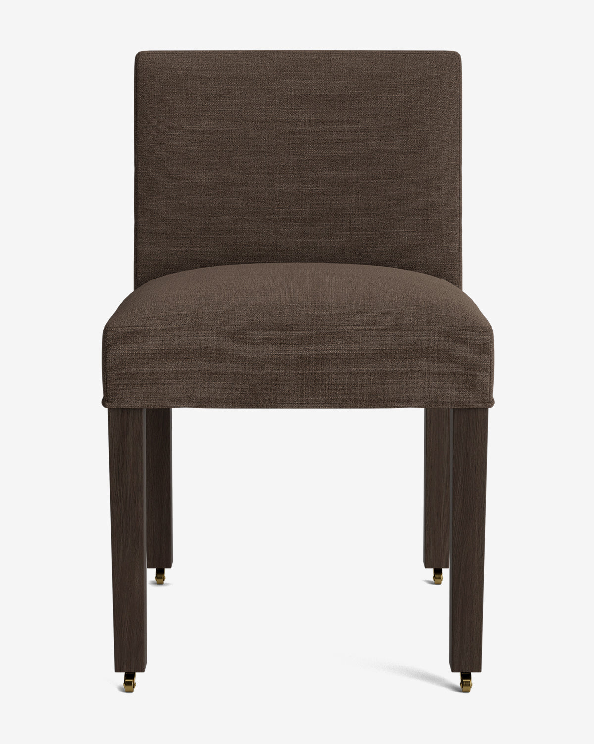 The Olivier Upholstered Dining Chair is a modern, armless dining chair in brown fabric with four straight wooden legs and small brass caster wheels on the front legs, displayed against a plain white background by McGee & Co.