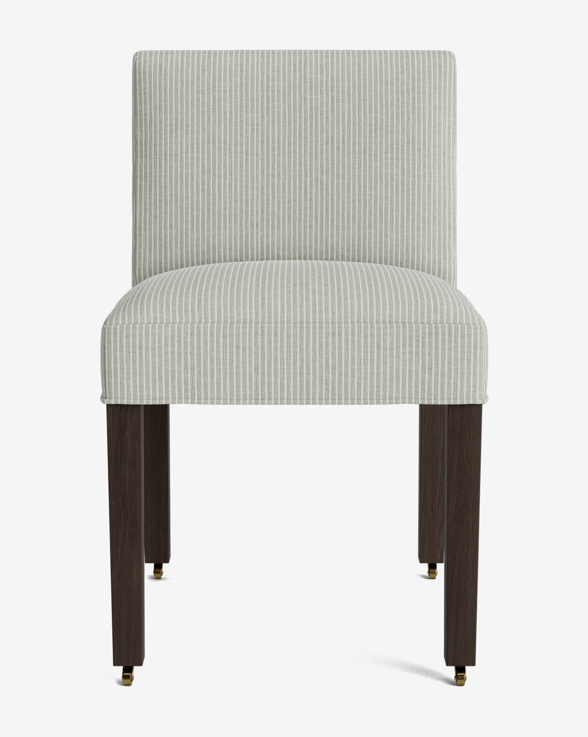The Olivier Upholstered Dining Chair features a front view with light gray and white vertical striped high-quality fabric, dark wooden legs, and small brass caster wheels on the front legs, by McGee & Co.