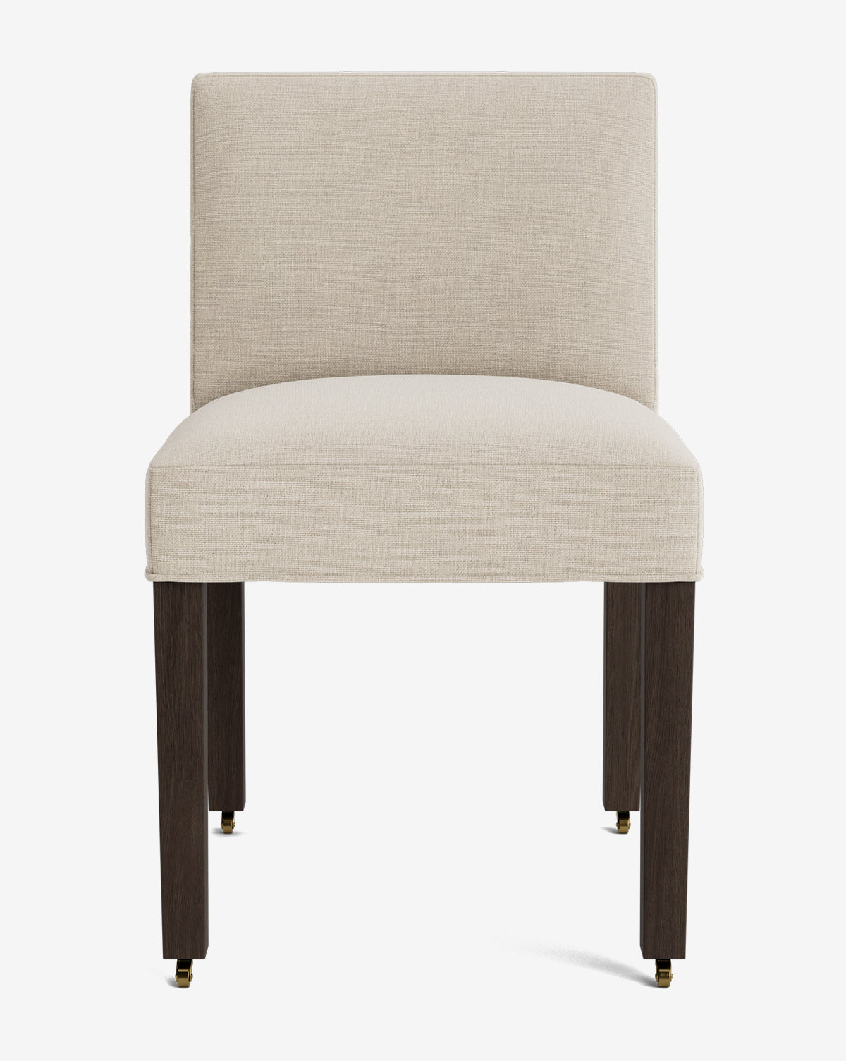 Front view of the Olivier Upholstered Dining Chair featuring a beige high-quality fabric seat and backrest, dark wooden legs, and small brass-colored casters on the front legs, by McGee & Co.