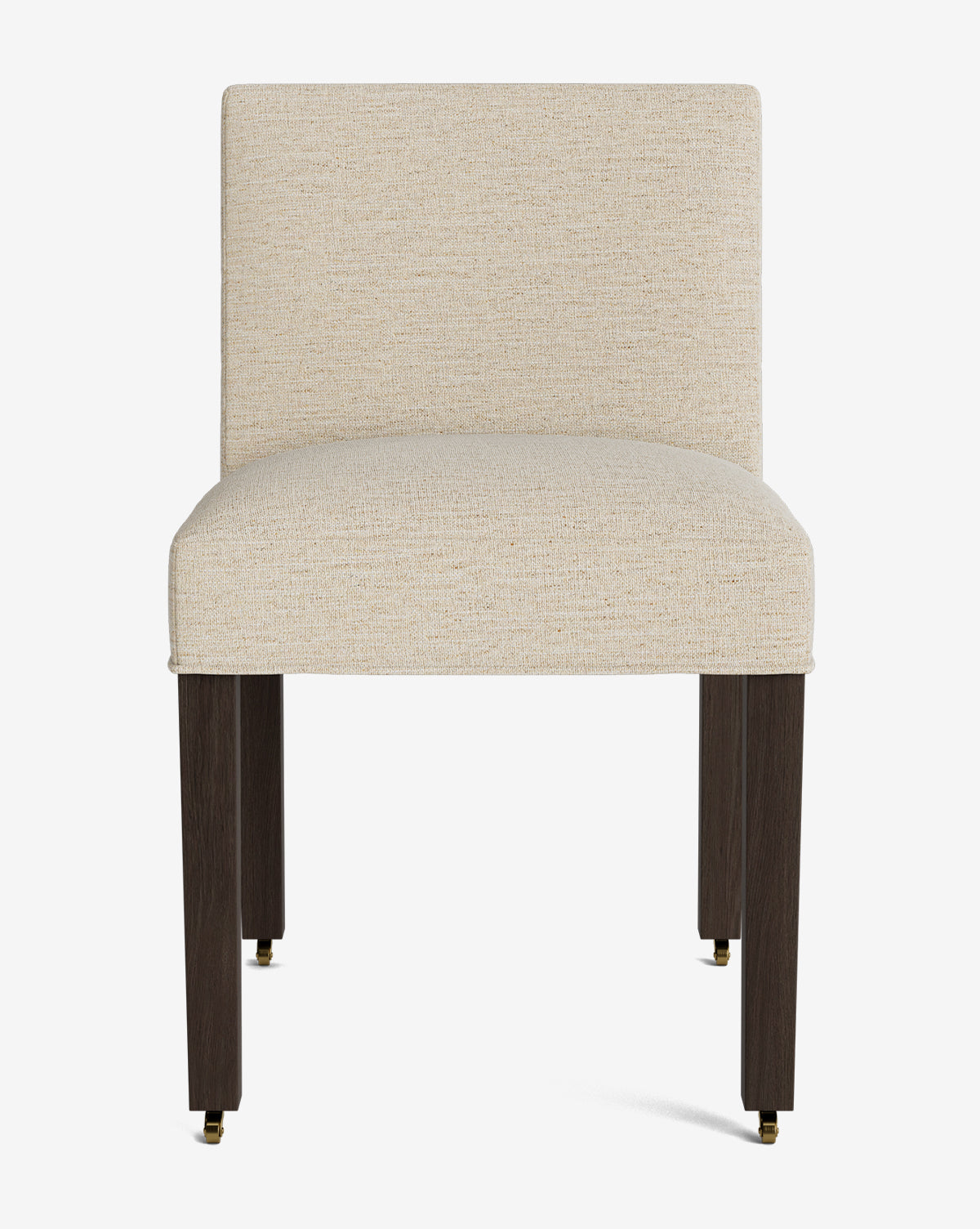 The Olivier Upholstered Dining Chair features a modern design with a light beige fabric seat and backrest, four dark wooden legs with brass metal caps, and is shown against a plain white background by McGee & Co.