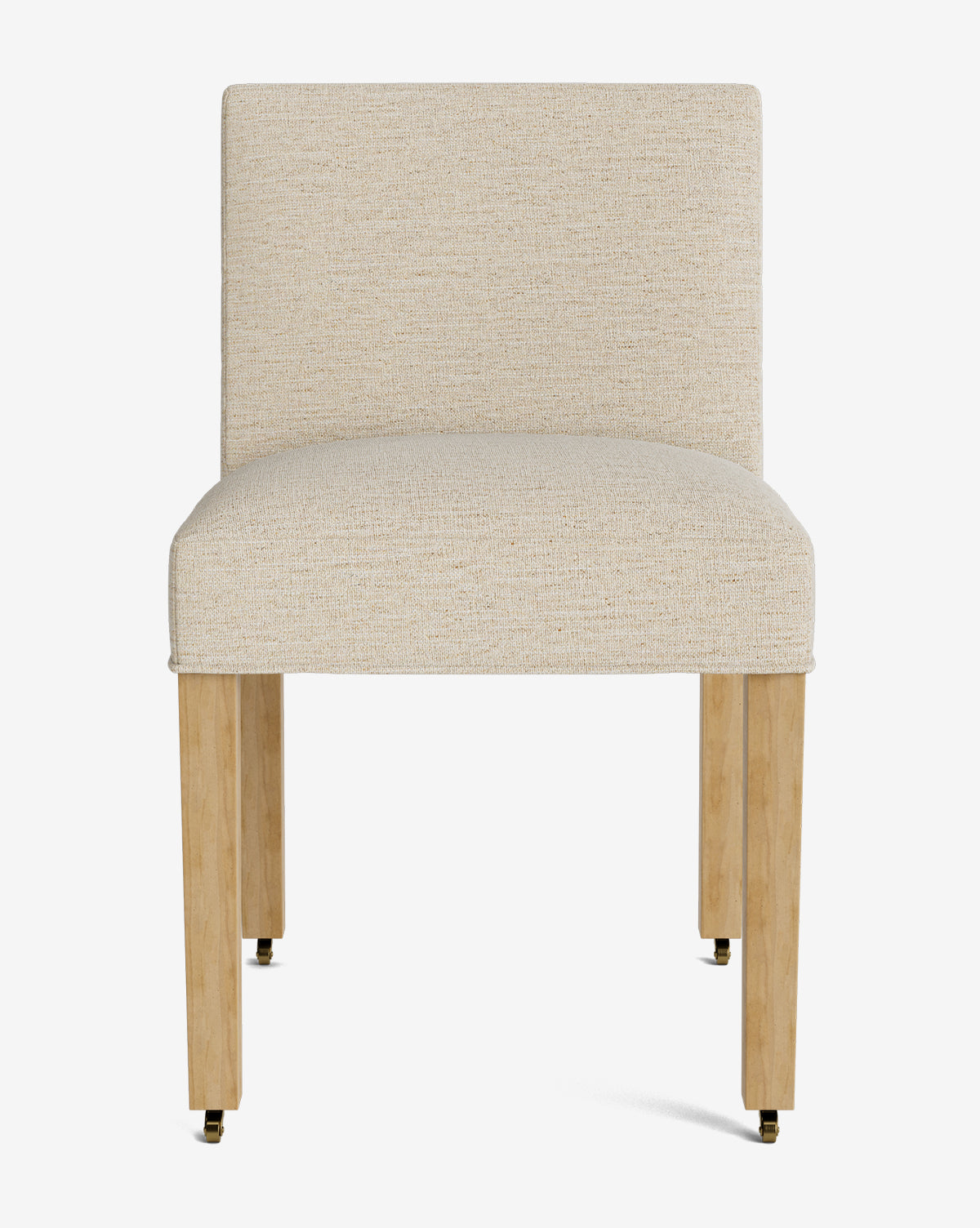 The Olivier Upholstered Dining Chair features a modern armless design with a beige fabric seat and back, four light wooden legs, and small metal casters on the front two legs, by McGee & Co.