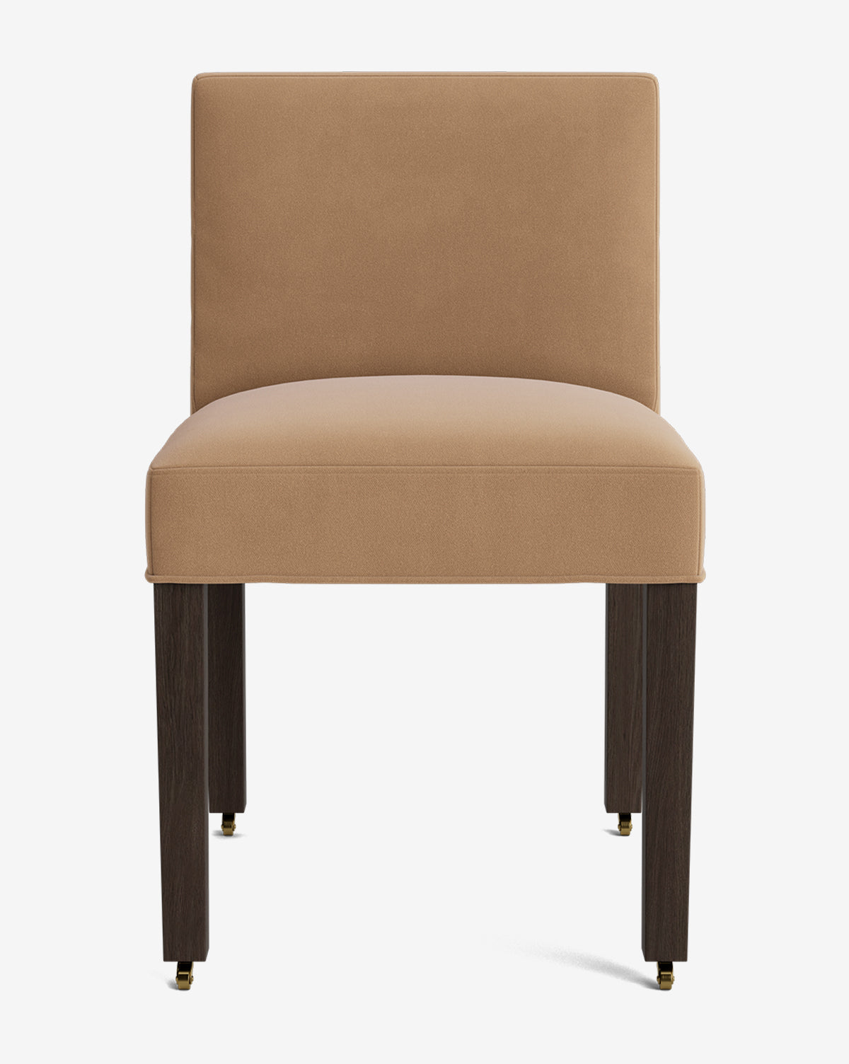 The Olivier Upholstered Dining Chair features a tan high-quality fabric seat and backrest, four straight dark wooden legs, and brass casters on the front legs, shown against a plain white background, by McGee & Co.