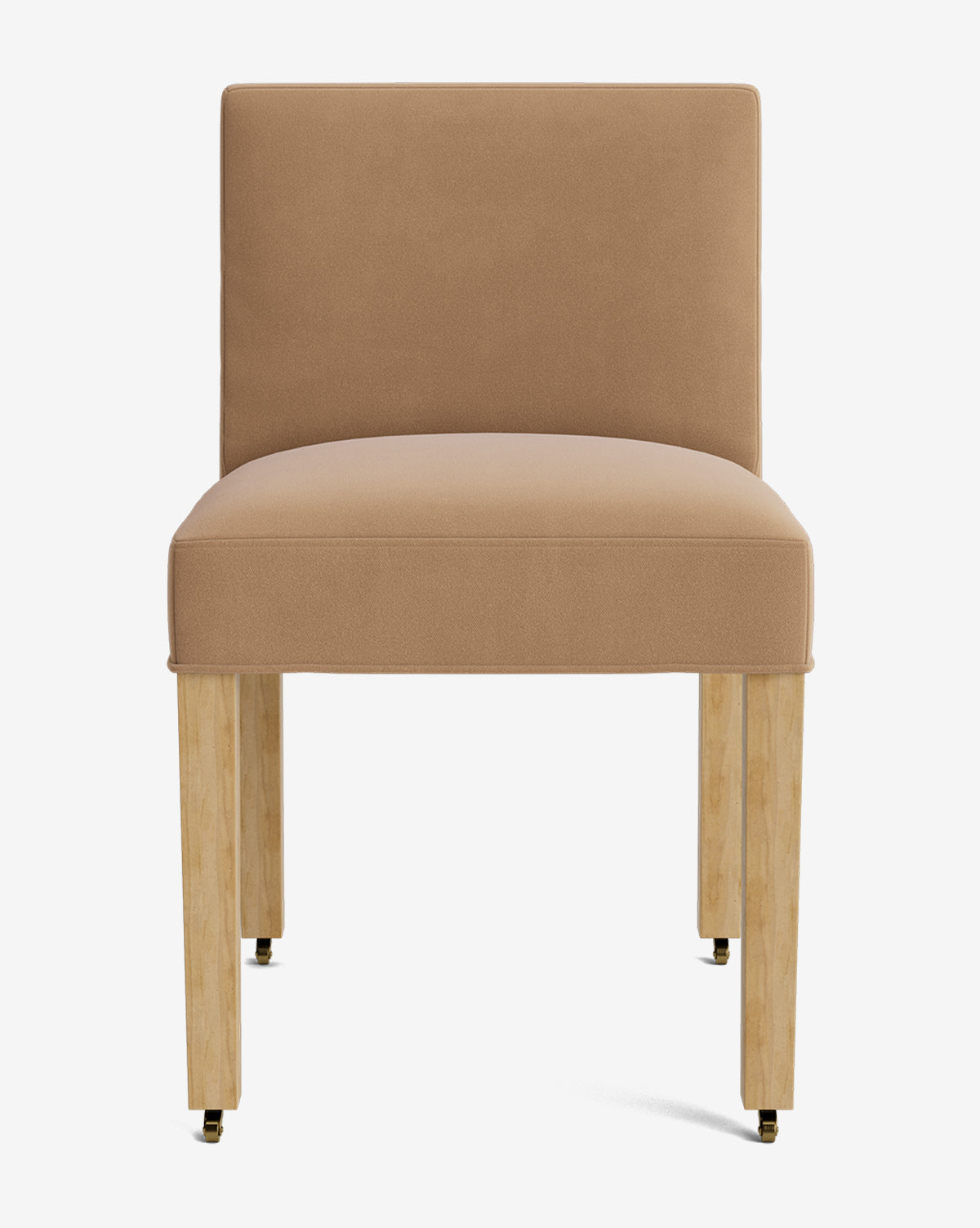 The Olivier Upholstered Dining Chair features a tan high-quality fabric seat and backrest, armless design, and four light wooden legs with brass-capped feet, shown against a plain white background by McGee & Co.