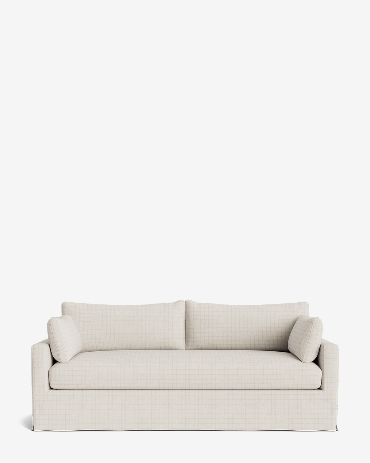 A light beige Peterson Classic Slipcover Sofa (75-100) with a straight back, two seat and back cushions, and two cylindrical side pillows with feather blend cushions is set against a plain white background, by McGee & Co.