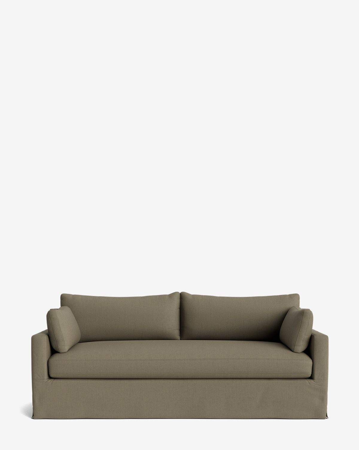 The Peterson Classic Slipcover Sofa (75-100) features a modern olive-green design with a skirted base, straight arms, feather blend cushions, and two matching bolster pillows, shown against a plain white background by McGee & Co.