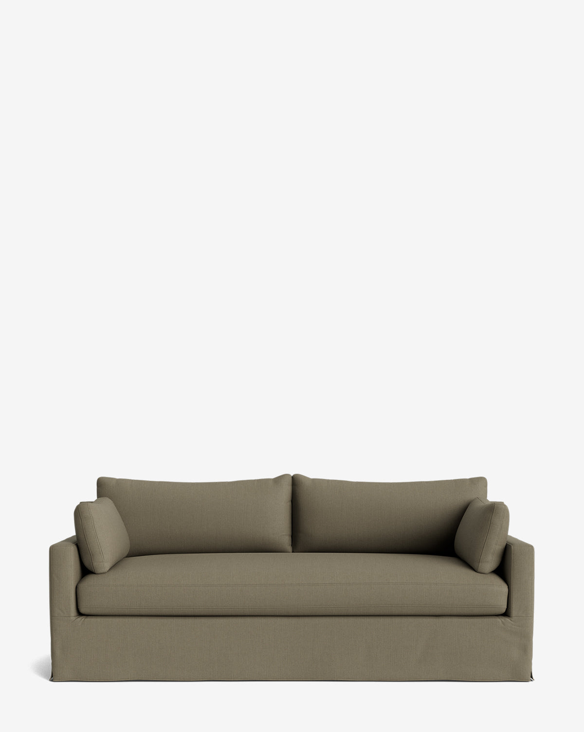A modern olive green Peterson Classic Slipcover Sofa (75-100) with square arms, loose back cushions, feather blend cushions, and two cylindrical bolster pillows sits against a plain white background, by McGee & Co.