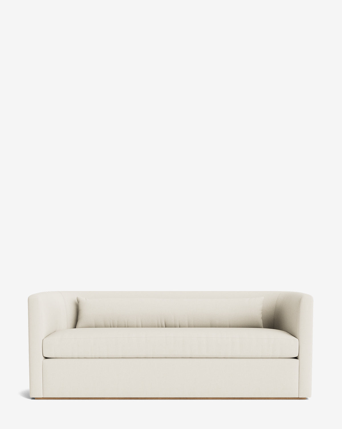 The Reese Sofa (84-96) showcases a modern, minimalist design with down-wrapped cushions, a low backrest, gently curved arms, and handcrafted alder wood, displayed against a plain white background by McGee & Co.