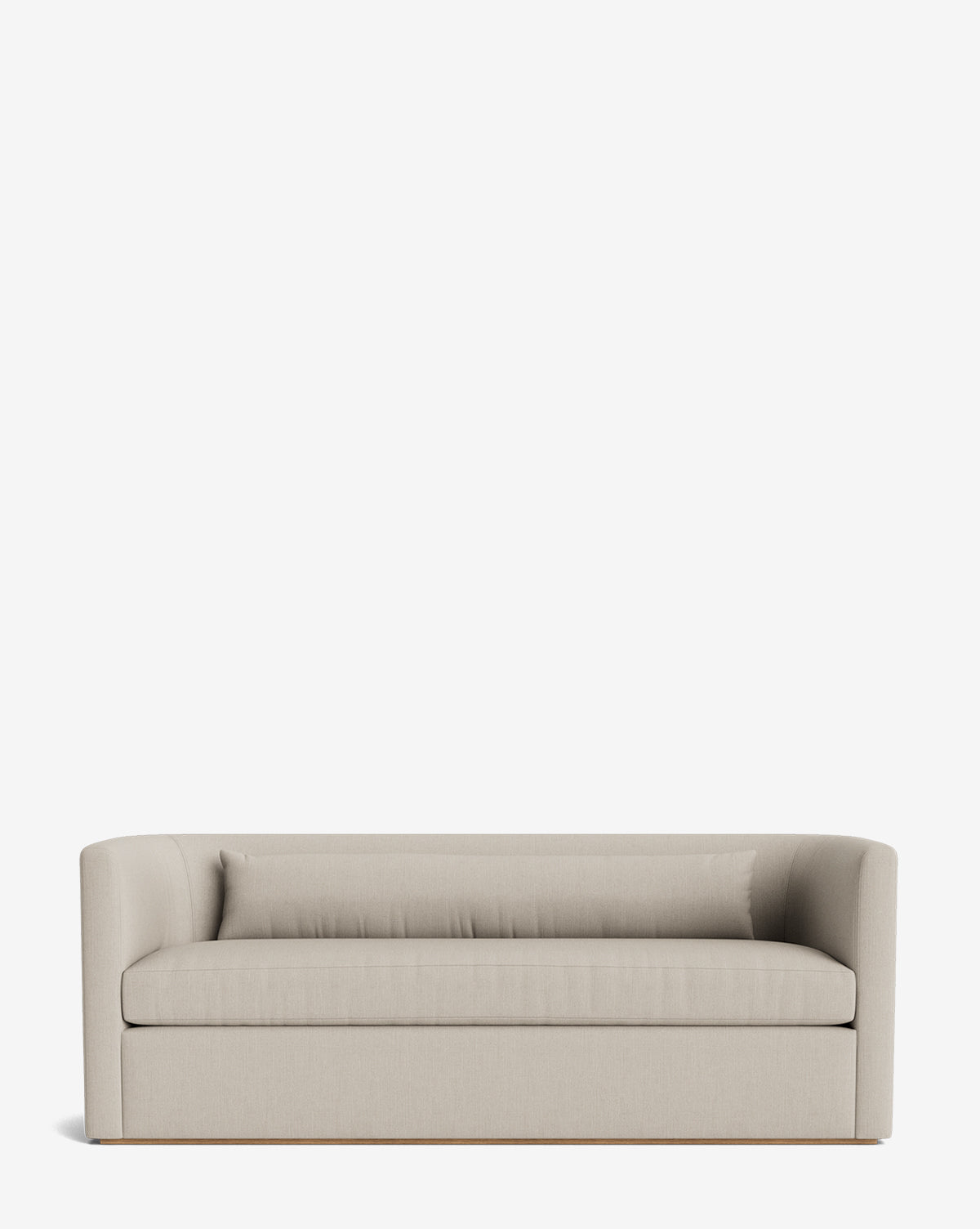 The Reese Sofa (84-96) features light beige upholstery, low arms and back, down-wrapped cushions, and a minimalist design. Handcrafted from alder wood, it offers subtle elegance against a plain white background, by McGee & Co.