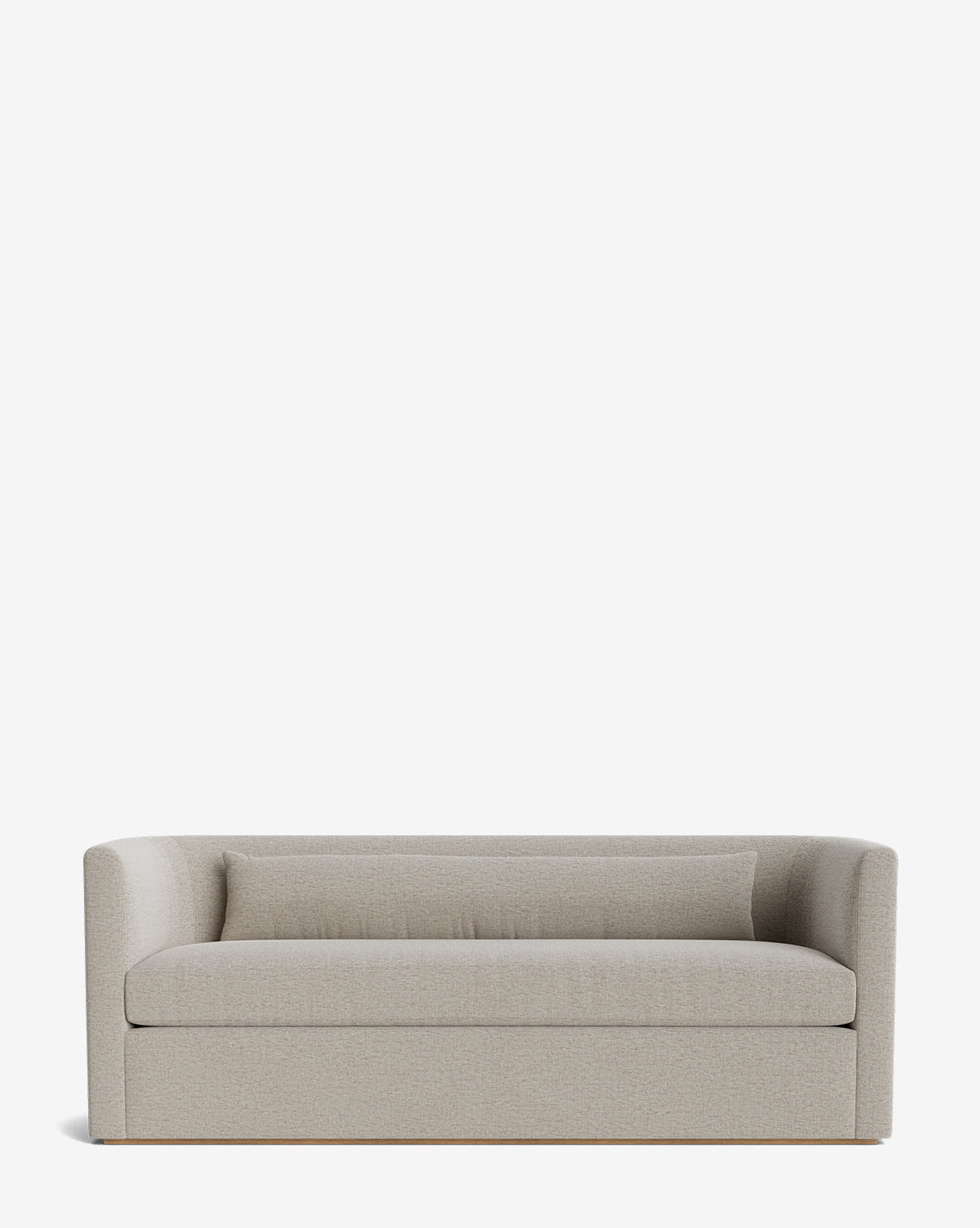 The Reese Sofa (84-96) offers modern light gray upholstery, a low backrest, curved armrests, a matching lumbar pillow, down-wrapped cushions, and handcrafted alder wood for comfort and durability against a plain white background by McGee & Co.