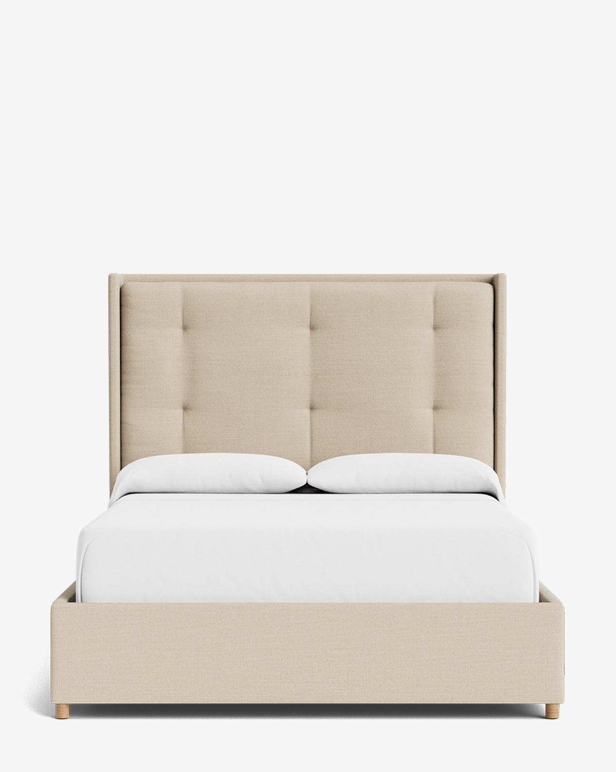 The Ria Bed is a customizable upholstered bed with a tall, tufted headboard and low-profile frame, shown here with white bedding and two pillows against a plain white background, by McGee & Co.