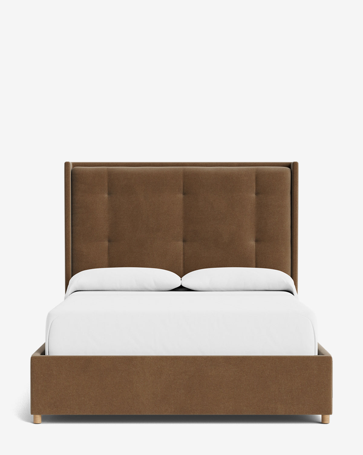 The Ria Bed features a customizable tall tufted brown upholstered headboard, paired with two white pillows and white bedding, all shown against a plain white background, by McGee & Co.