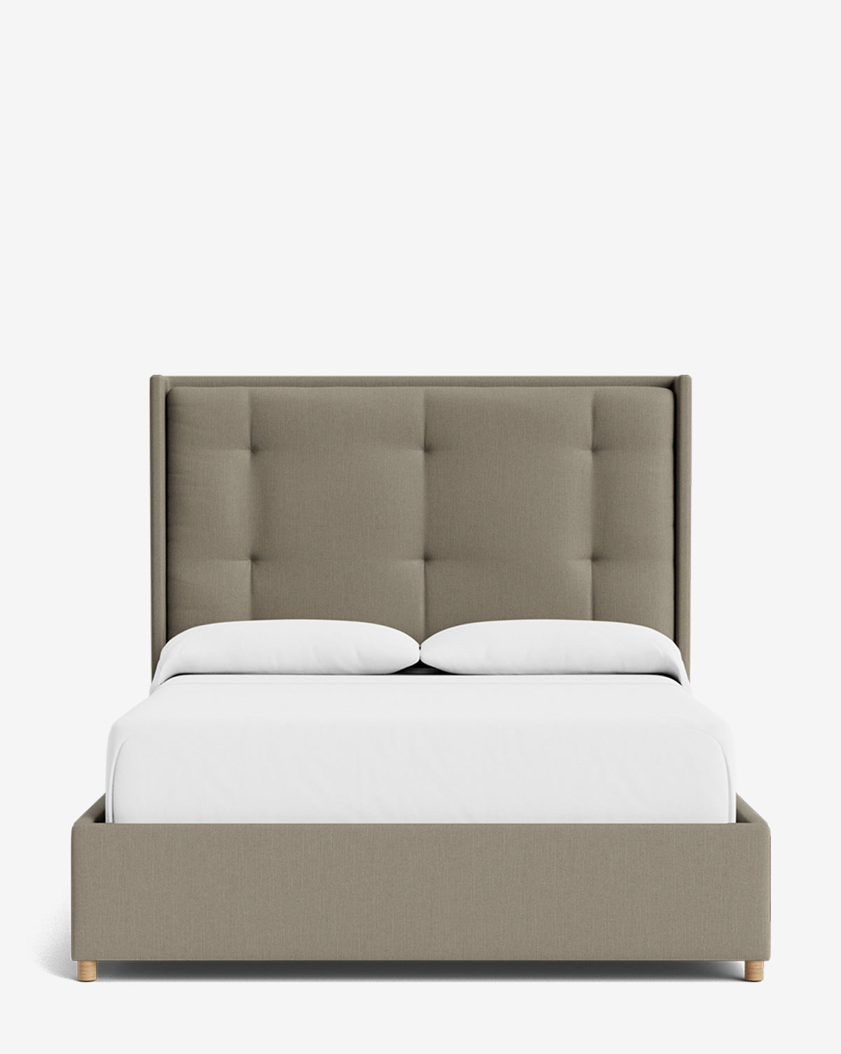 The Ria Bed features a tall, tufted beige fabric headboard, white bedding, and wooden legs. This modern upholstered bed is shown from the front against a white background and offers customizable options by McGee & Co.