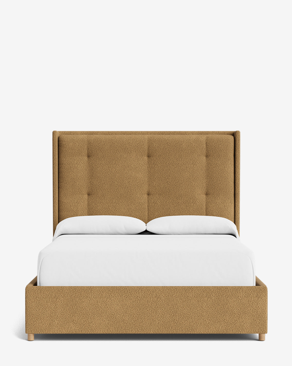 The Ria Bed features a modern tan textured upholstered frame with a customizable tufted headboard. Presented against a plain white background, it’s neatly styled with crisp white sheets and two matching pillows by McGee & Co.