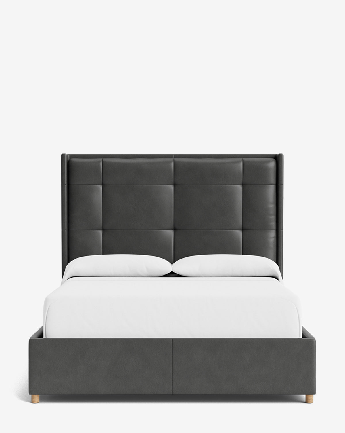 The Ria Bed features modern black upholstery, a customizable tall tufted headboard, and crisp white bedding, displayed against a plain white background, by McGee & Co.