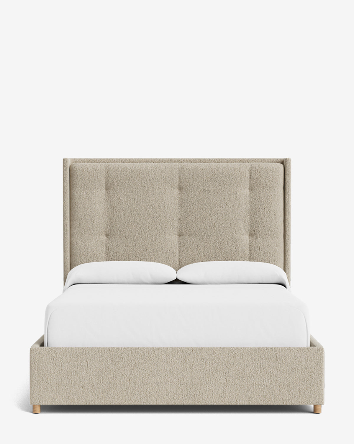 The Ria Bed is a modern, customizable upholstered bed featuring a tall tufted headboard, white bedding, and two pillows, displayed front-facing against a plain white background by McGee & Co.