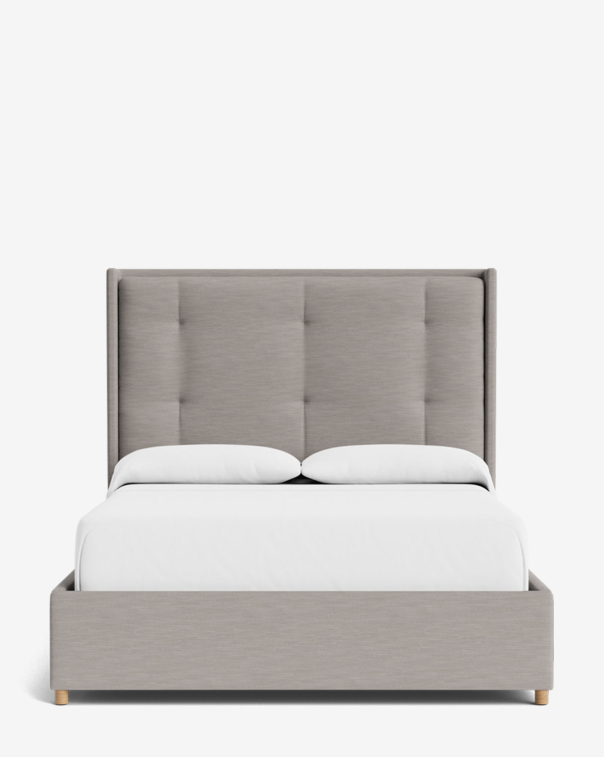 The Ria Bed is a modern, customizable upholstered bed frame in light gray with a tall tufted headboard and crisp white bedding, shown from the front against a white background, by McGee & Co.