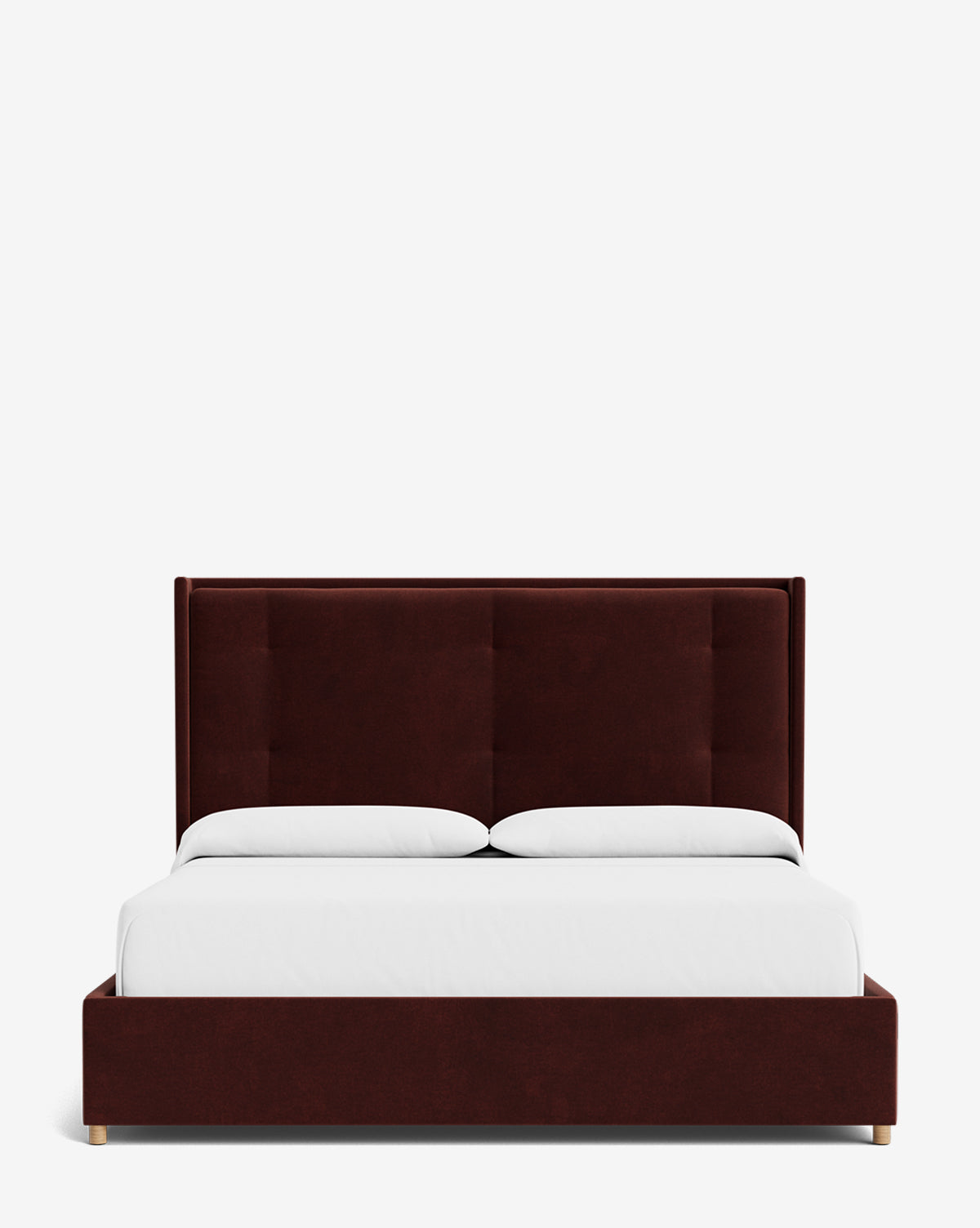 The Ria Bed features a modern upholstered design with a tall, tufted headboard and matching dark brown frame, complete with a neatly made white mattress and pillows, set against a plain white background by McGee & Co.