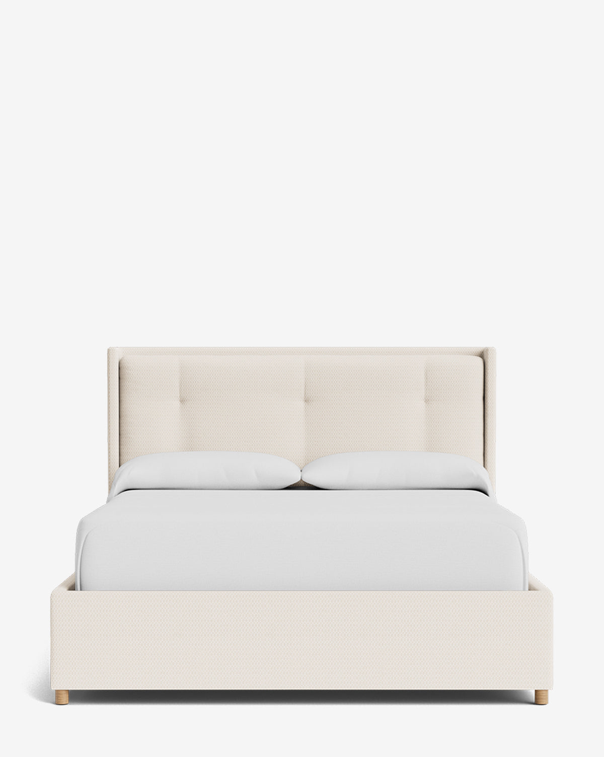 The Ria Bed Low Headboard is a modern upholstered bed with clean lines, featuring a light beige fabric headboard and frame, plus two white pillows, all shown against a plain white background by McGee & Co.