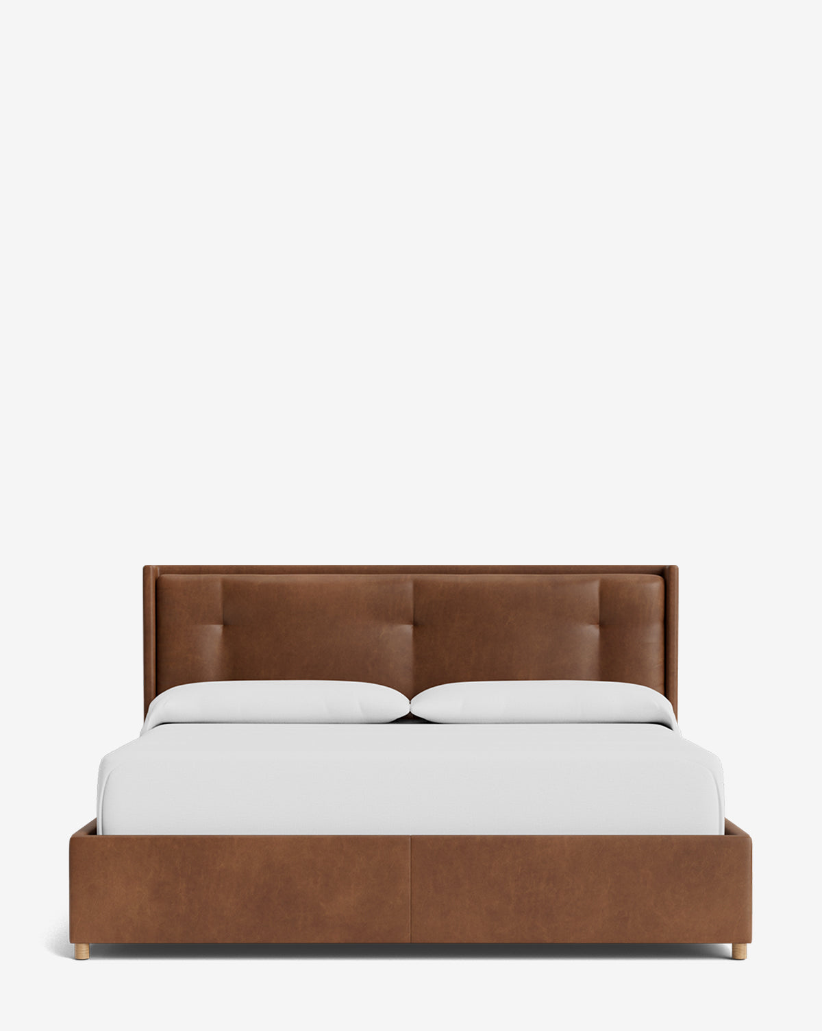The Ria Bed Low Headboard is a modern bed with a brown leather base, low profile, and plain white bedding, shown from the front against a white background by McGee & Co.