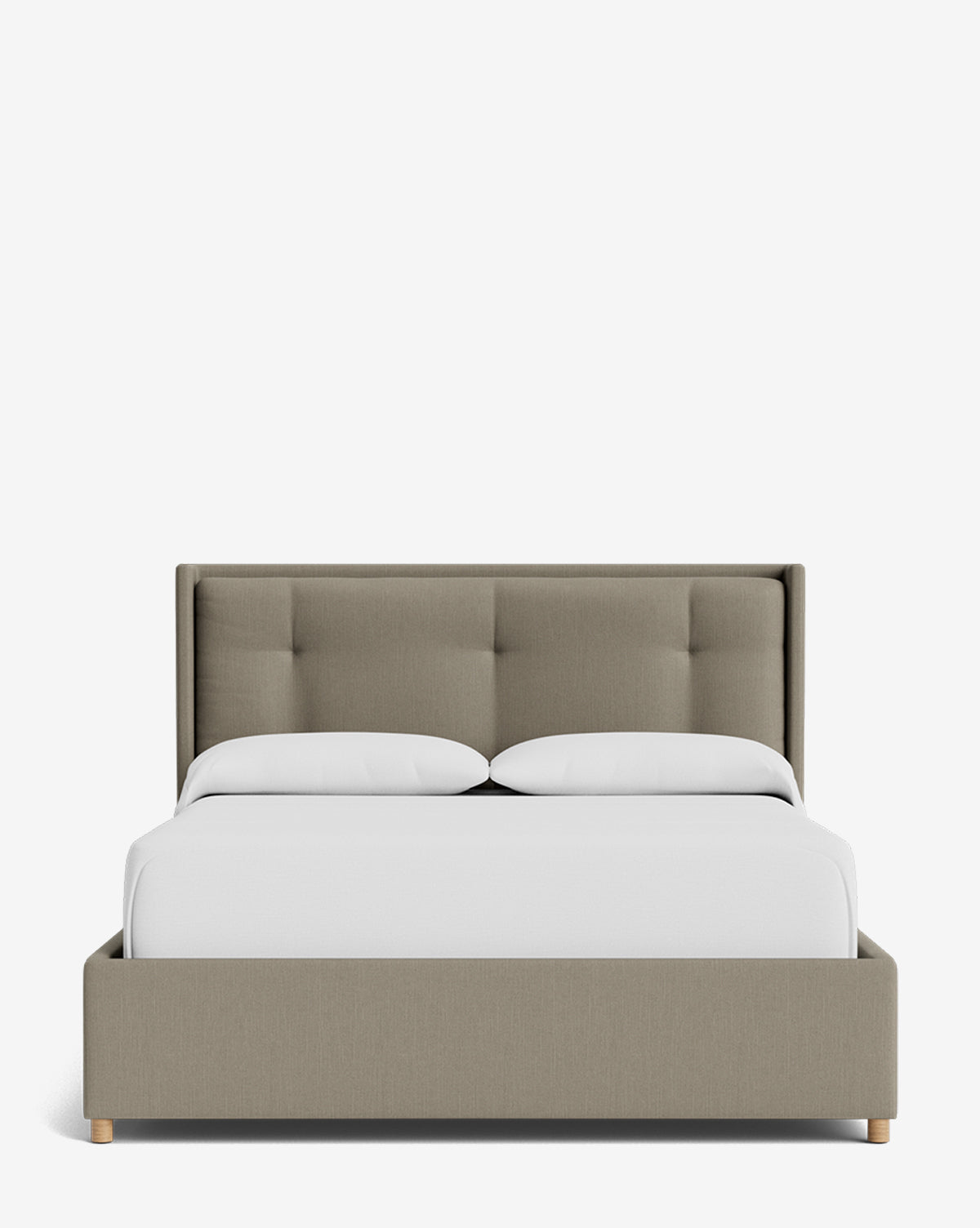 The Ria Bed Low Headboard showcases a light brown upholstered frame with a tufted headboard, dressed in white bedding and two pillows, set against a plain white background by McGee & Co.