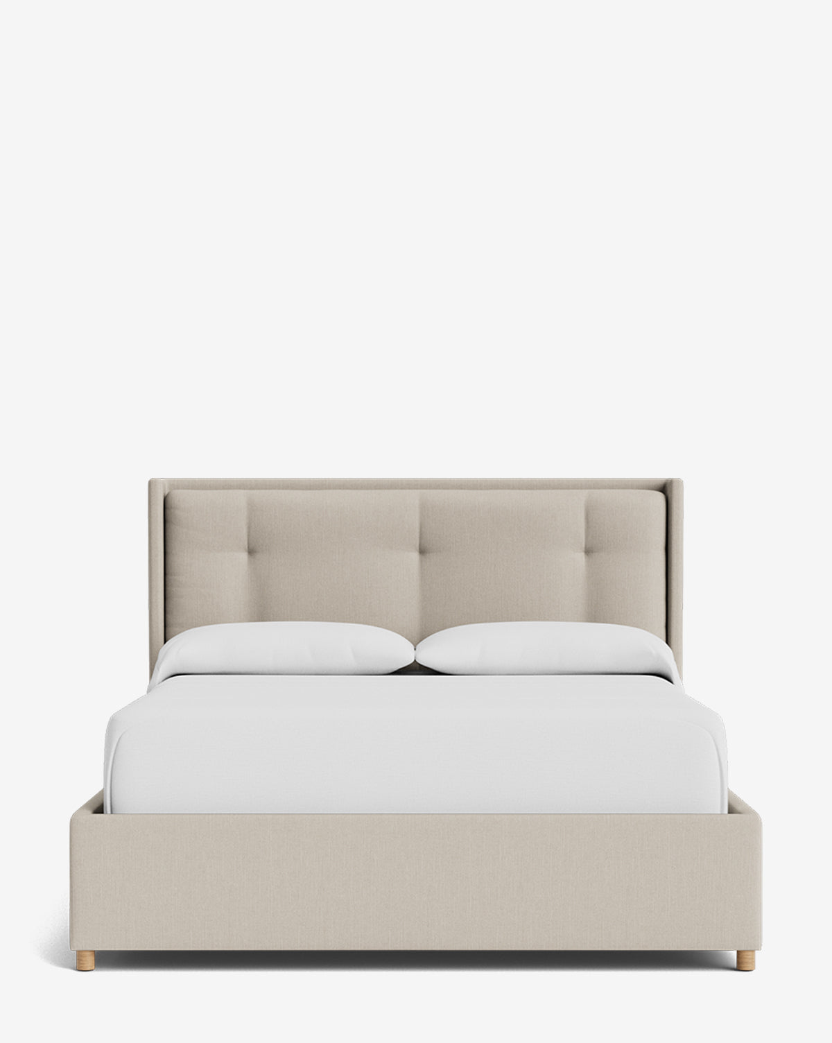 The Ria Bed Low Headboard is shown from the front against a plain white background, featuring beige upholstery, a tufted low headboard, white bedding, and two pillows by McGee & Co.