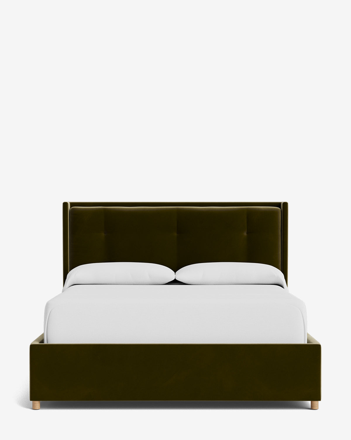 The Ria Bed Low Headboard features modern, dark green upholstery with a tall tufted headboard and wooden legs, styled with white bedding and two pillows on a plain white background by McGee & Co.