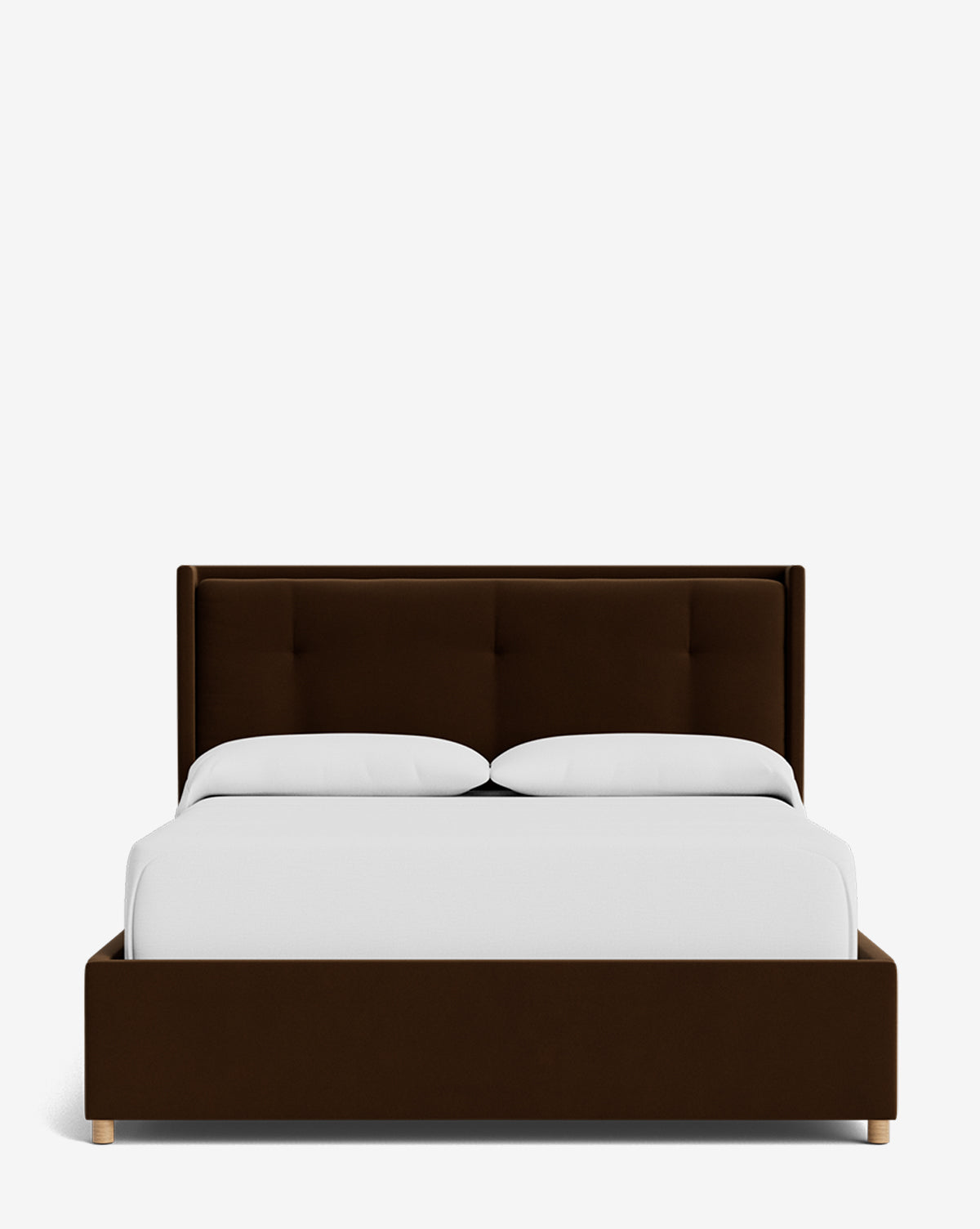 The Ria Bed Low Headboard features a modern dark brown upholstered frame and headboard, two white pillows, and a white duvet, all set against a plain white background for an elegant bedroom look by McGee & Co.