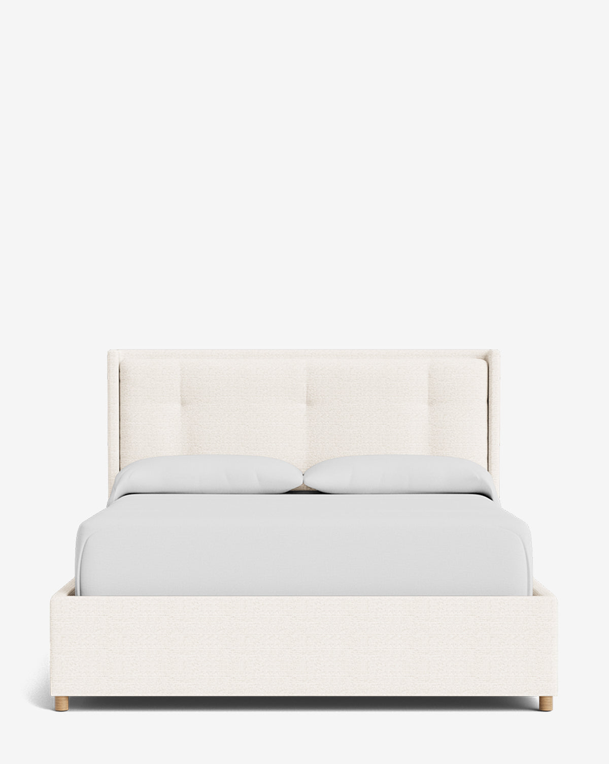 The Ria Bed Low Headboard features modern upholstery in light beige, a sleek low headboard, and is styled with neatly arranged light gray bedding and pillows, all set against a plain white background by McGee & Co.