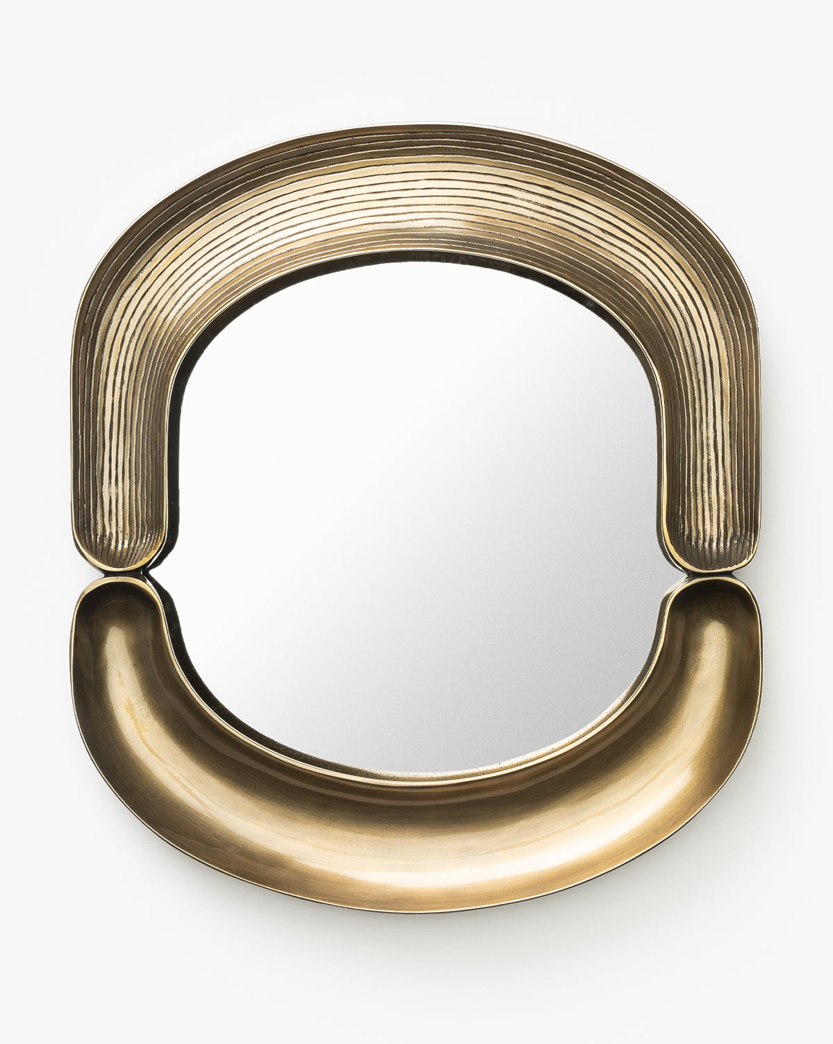 The Salvatore Wall Mirror has a unique antique gold finish, a ribbed top arch, and a smooth rounded bottom, shown against a white background by McGee & Co.