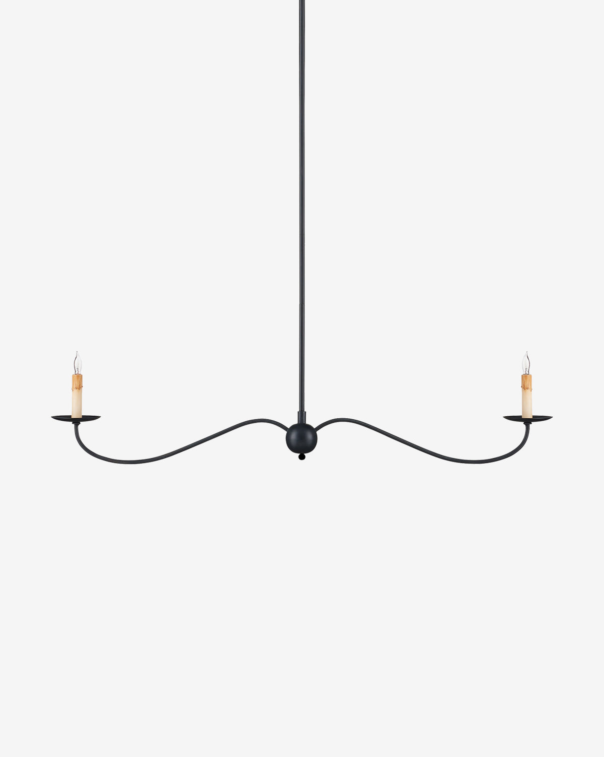 The Saxon Linear Chandelier by Currey & Co. features a minimalist black metal frame with two candle-shaped bulbs on curved rattan-wrapped iron arms, suspended from a long thin rod for a refined modern look—McGee & Co.