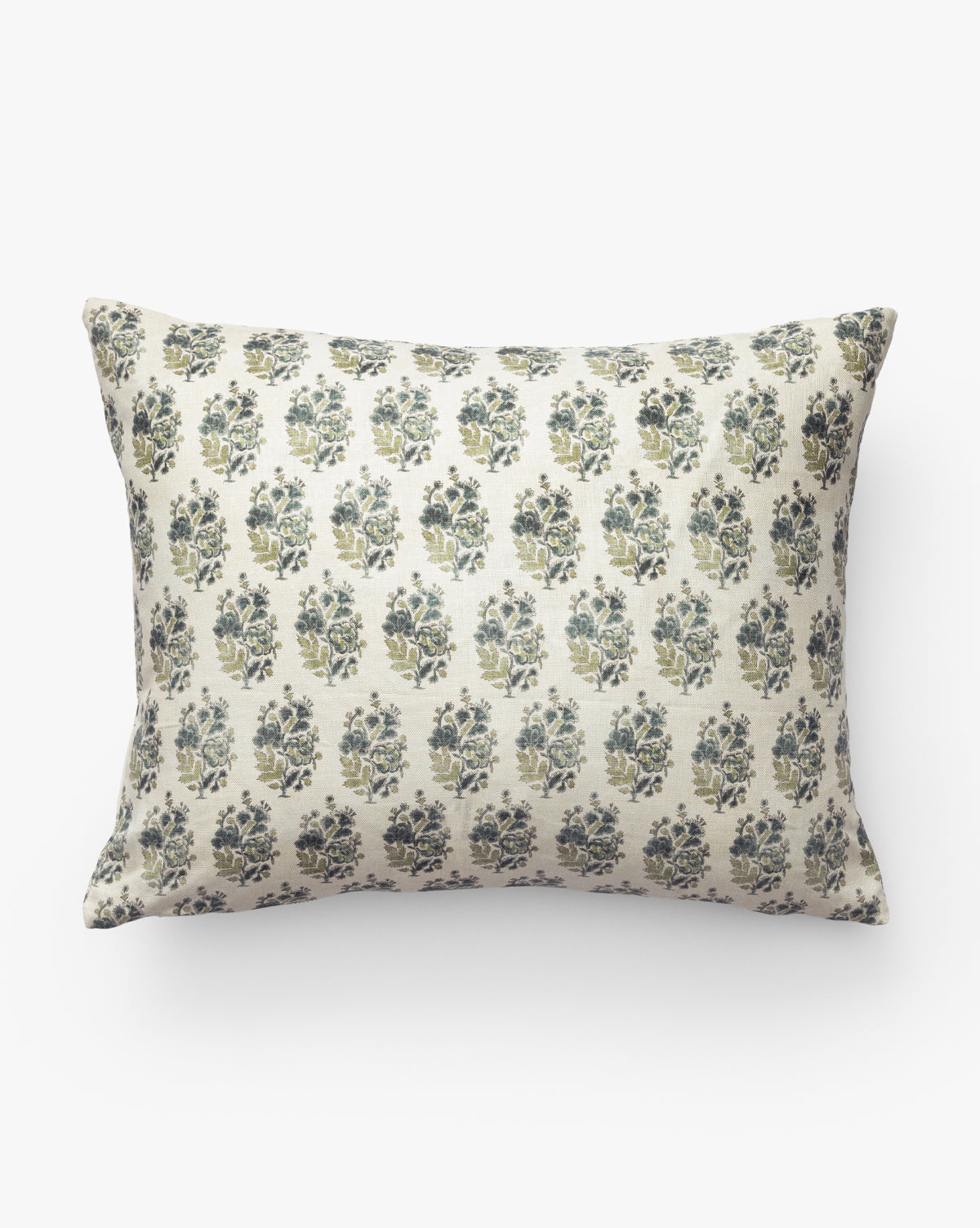 The Selah Pillow Cover is a rectangular linen pillow with a beige background and a repeating pattern of small dark blue and green floral bouquets—an elegant accent for classic living room decor, by McGee & Co.