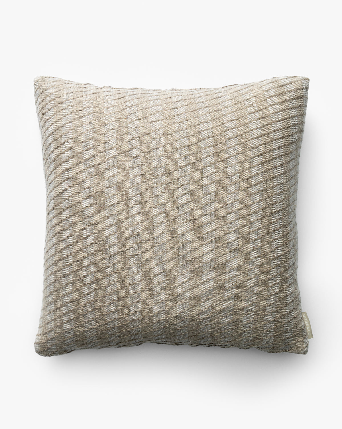 The Syracuse Pillow Cover is a square, beige decorative pillow cover with a ribbed, subtly striped linen texture, shown against a plain white background by McGee & Co.