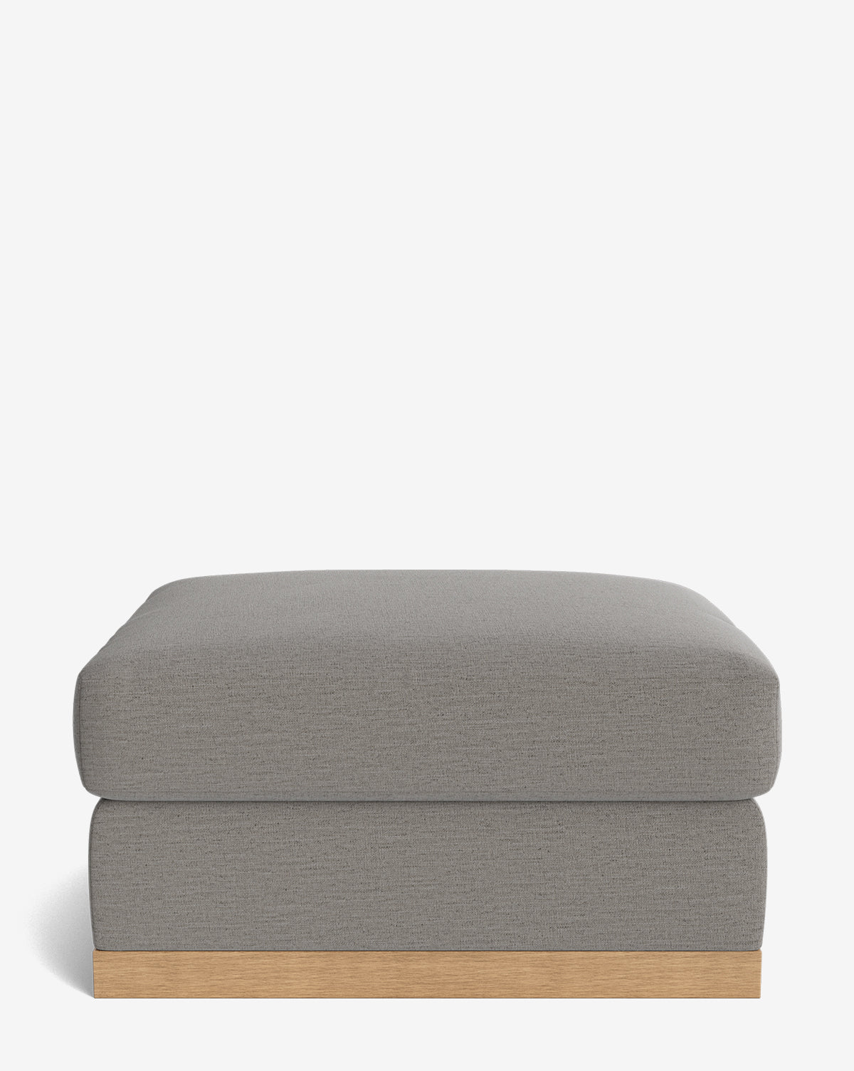 The Vernon Modular Ottoman features a modern rectangular design with a cushioned top and wooden base, shown against a plain white background, by McGee & Co.
